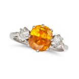 A VINTAGE ORANGE SAPPHIRE AND DIAMOND THREE STONE RING in 18ct white gold, set with a cushion cut...