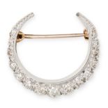A VINTAGE DIAMOND CRESCENT MOON BROOCH in yellow and white gold, designed as a crescent moon set ...