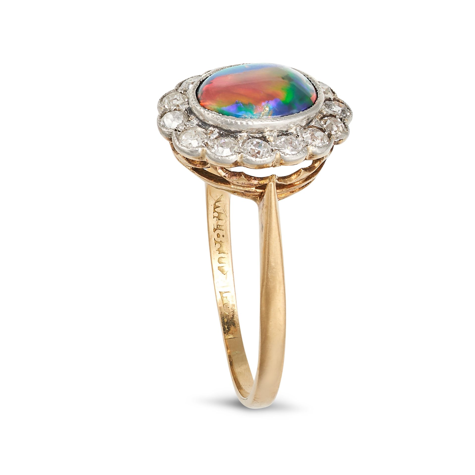A BLACK OPAL AND DIAMOND CLUSTER RING in 18ct yellow gold, set with an oval cabochon black opal i... - Bild 2 aus 2