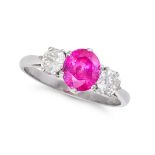 A RUBY AND DIAMOND THREE STONE RING in 18ct white gold, set with a cushion cut ruby of 1.59 carat...