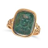 AN ANTIQUE BLOODSTONE INTAGLIO RING in yellow gold, set with a bloodstone intaglio carved to depi...