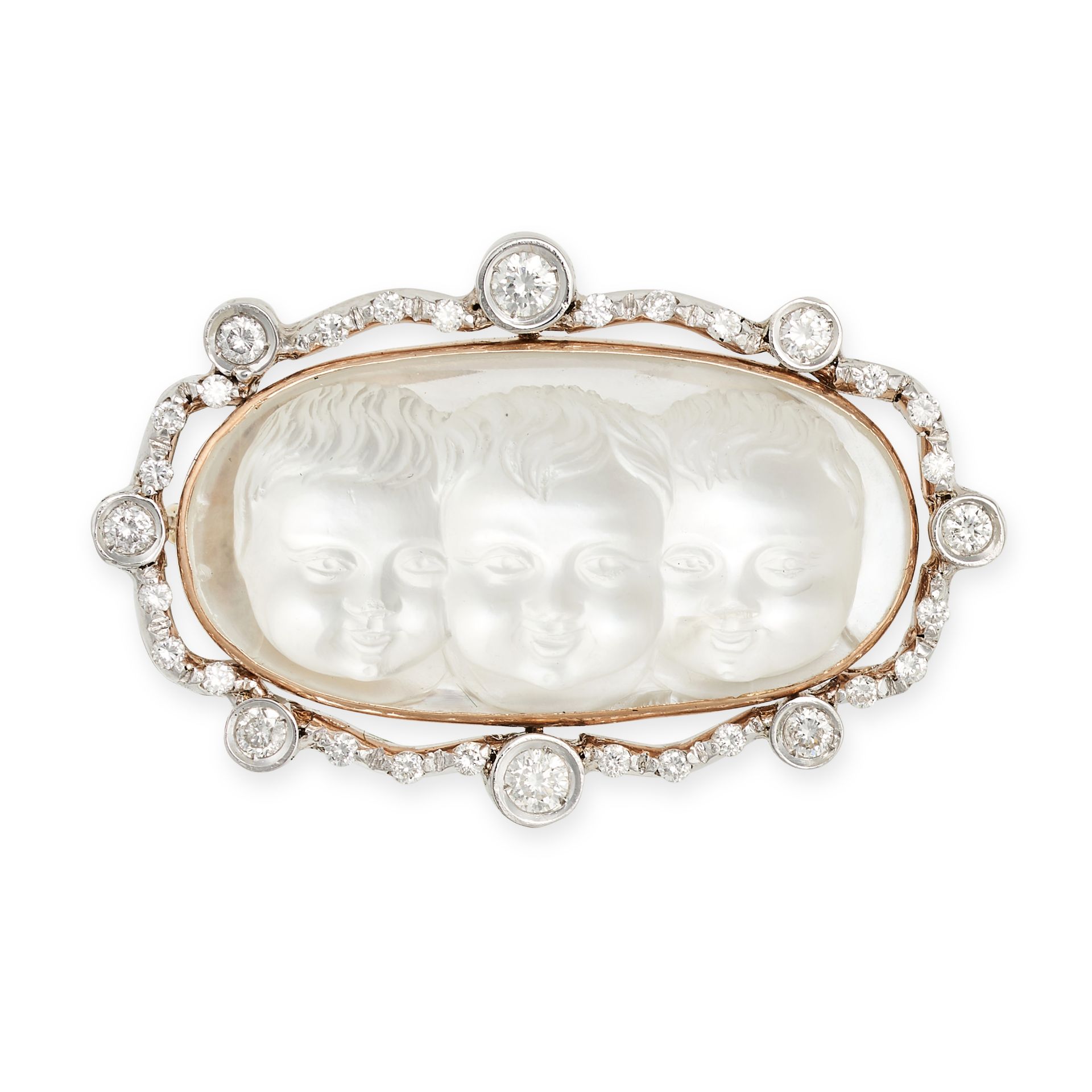 A MOONSTONE AND DIAMOND BROOCH set with a moonstone carved to depict three children's faces, in a...