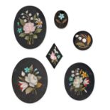 A GROUP OF UNMOUNTED ANTIQUE PIETRA DURA PLAQUES comprising seven pietra dura plaques inlaid with...