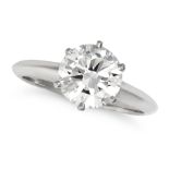 TIFFANY & CO., A SOLITAIRE DIAMOND RING in platinum, set with a round brilliant cut diamond of 2....