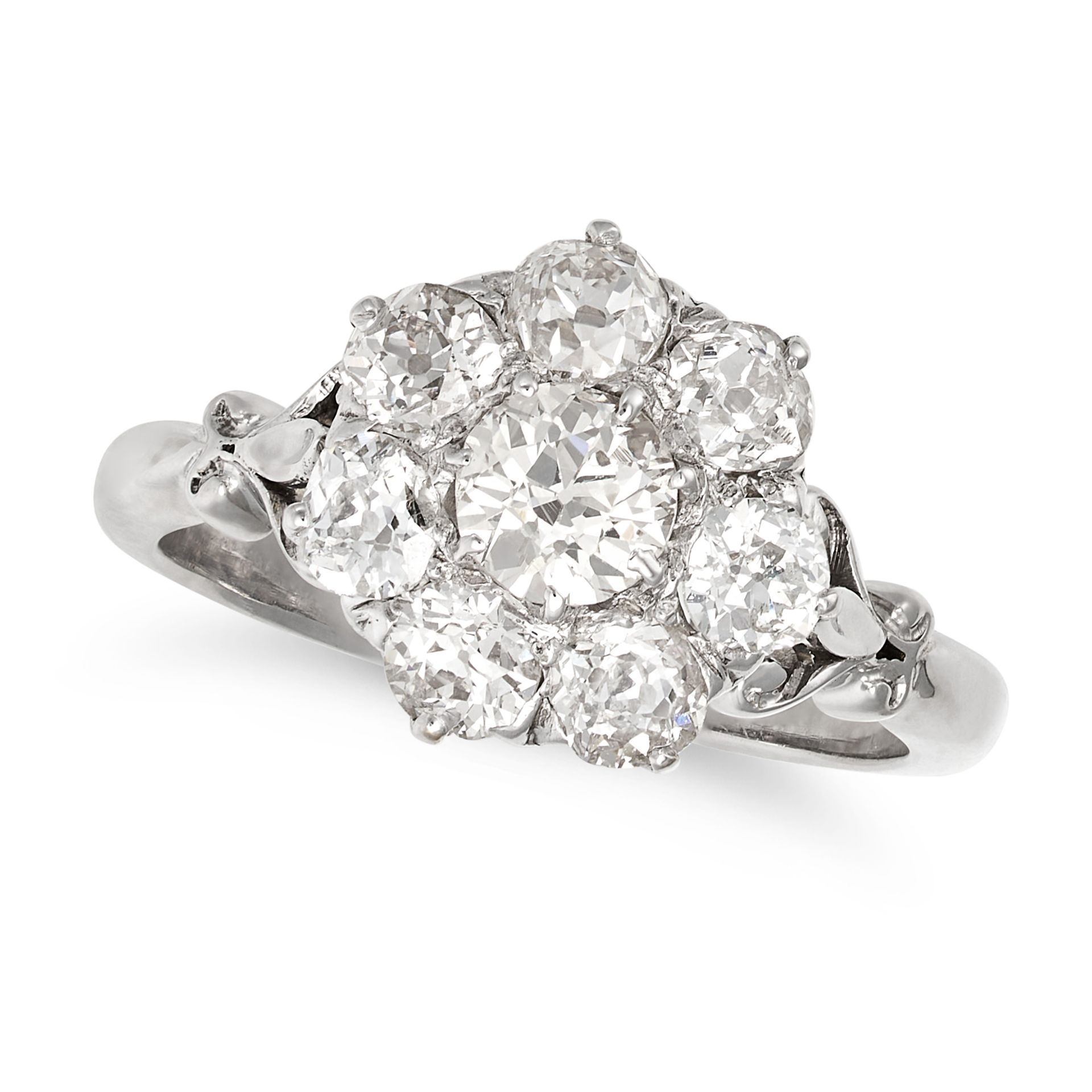 A DIAMOND CLUSTER RING in white gold, set with a cluster of old European cut diamonds all totalli...