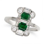 A FINE TSAVORITE GARNET AND DIAMOND DRESS RING set with two octagonal step cut tsavorite garnets ...