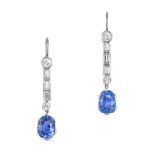 A PAIR OF CEYLON NO HEAT SAPPHIRE AND DIAMOND DROP EARRINGS each set with a row of round brillian...