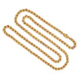 AN ANTIQUE GOLD CHAIN NECKLACE in yellow gold, comprising a row of fancy links designed as flower...