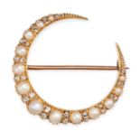 AN ANTIQUE DIAMOND AND PEARL CRESCENT MOON BROOCH / PENDANT in 15ct yellow gold, designed as a cr...