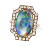 A FINE ANTIQUE BLACK OPAL AND DIAMOND RING in yellow gold, set with an oval cabochon opal of appr...