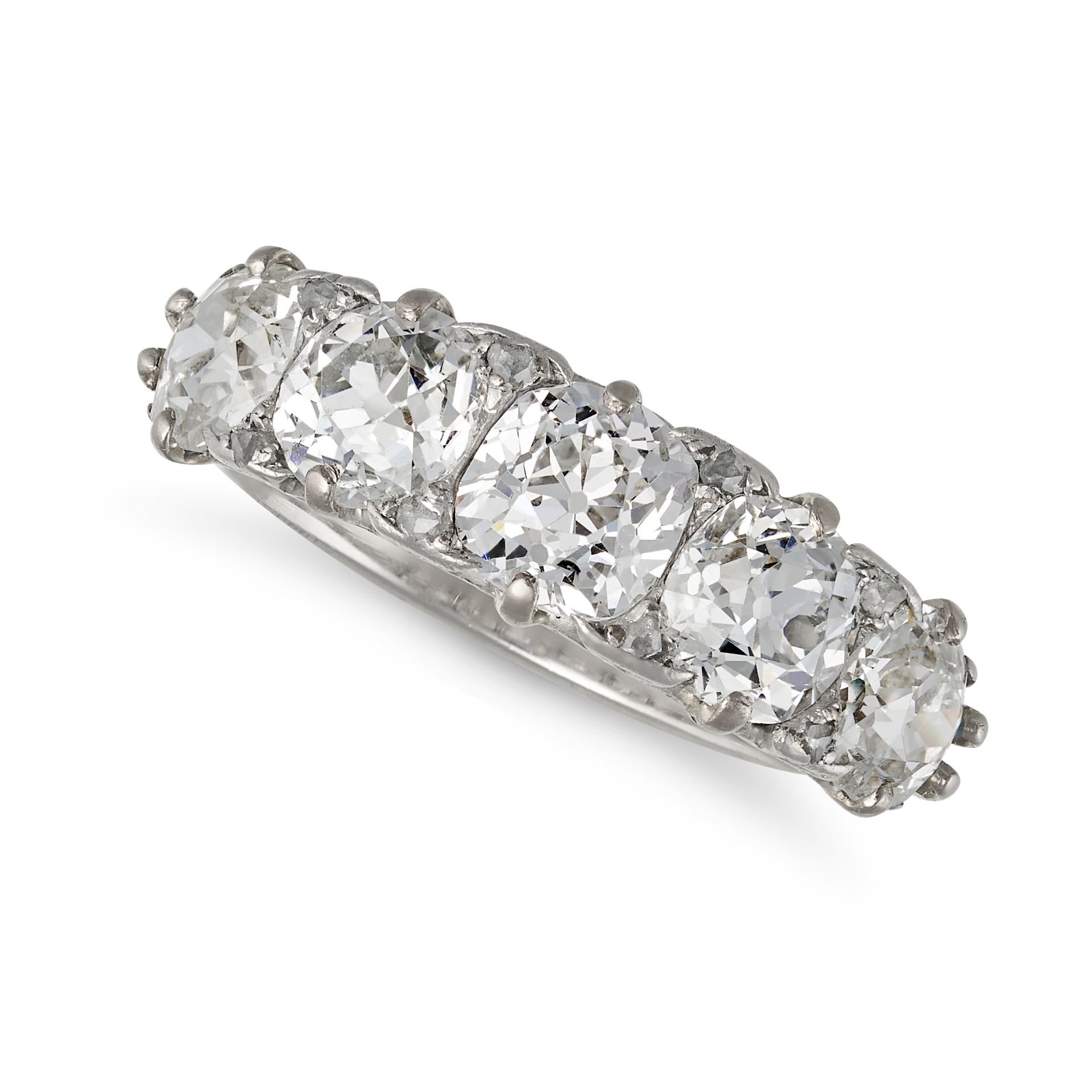 A FINE ANTIQUE DIAMOND FIVE STONE RING, EARLY 20TH CENTURY in platinum, set with a row of five gr...