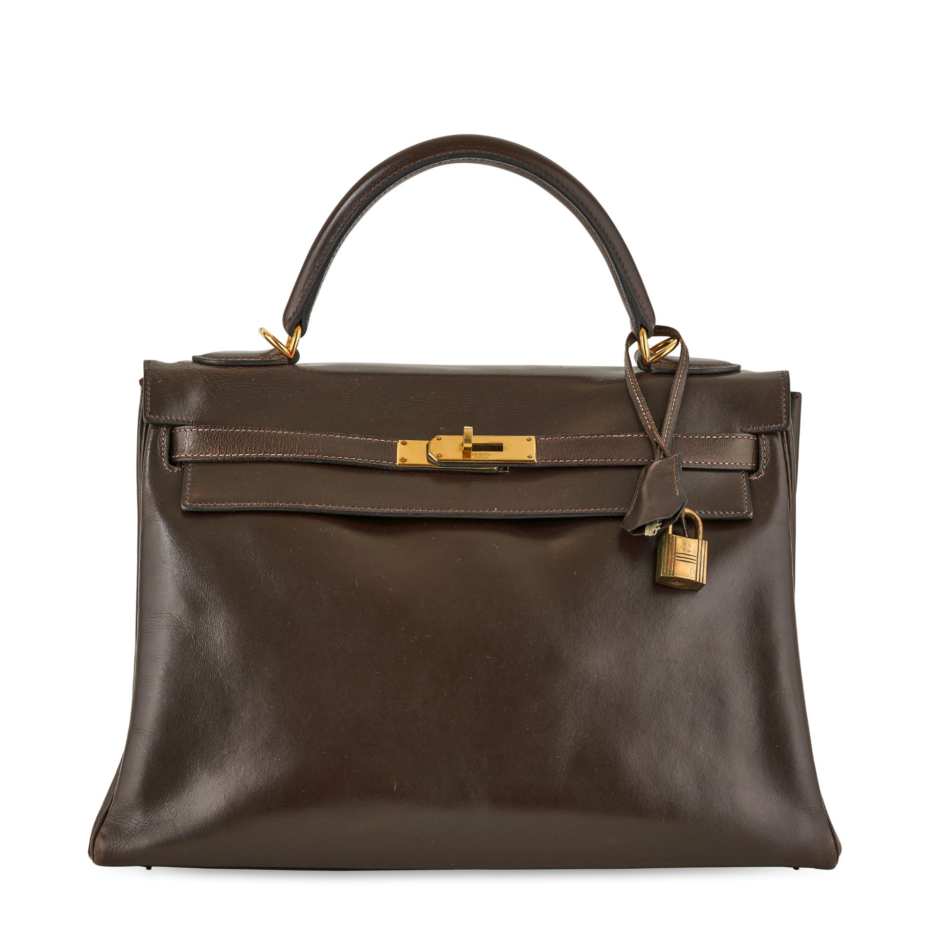 HERMES, A VINTAGE BROWN BOX KELLY 28 BAG (INCLUDES PADLOCK, KEYS AND CLOCHETTE)