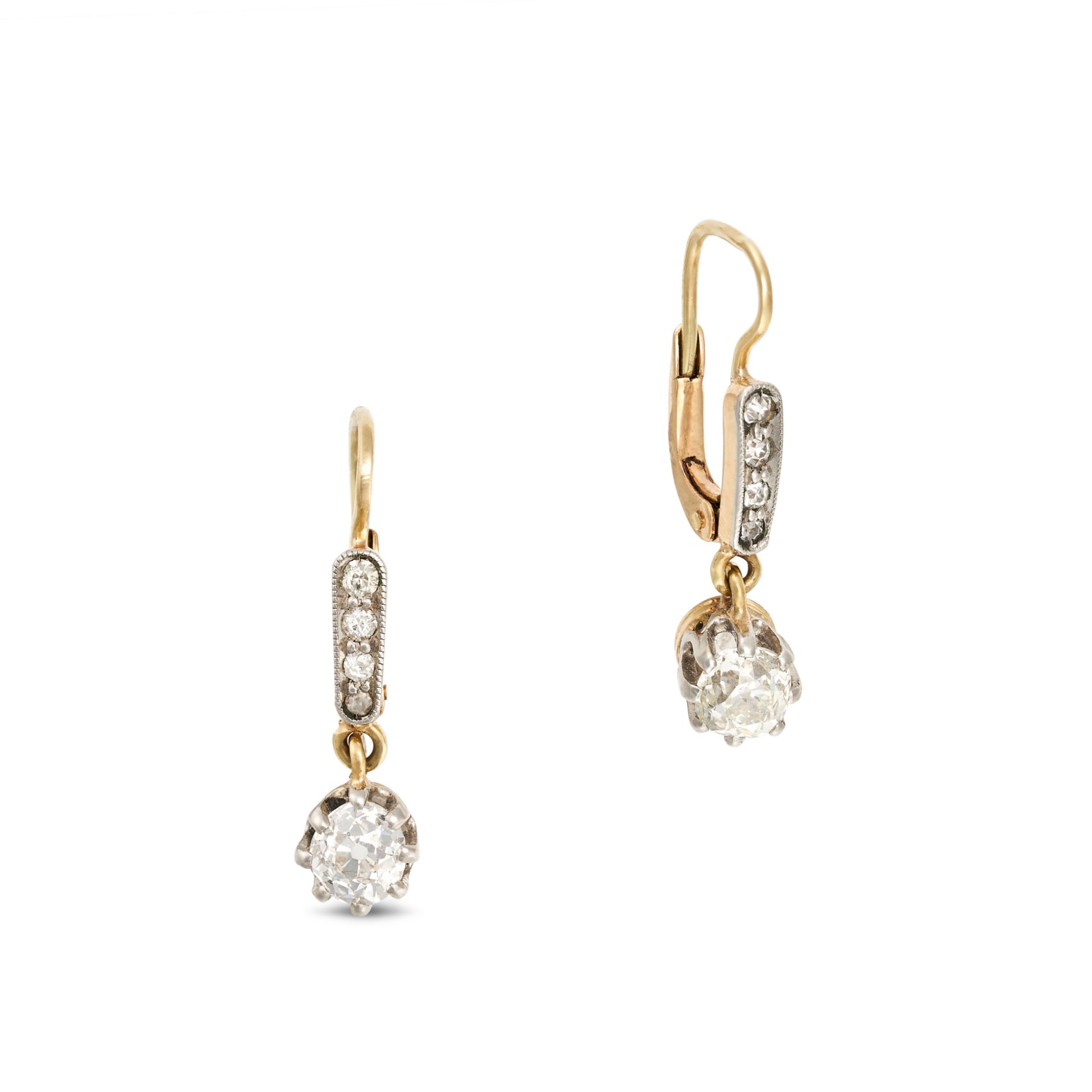 A PAIR OF ANTIQUE DIAMOND DROP EARRINGS in yellow gold, each comprising a row of old and single c...