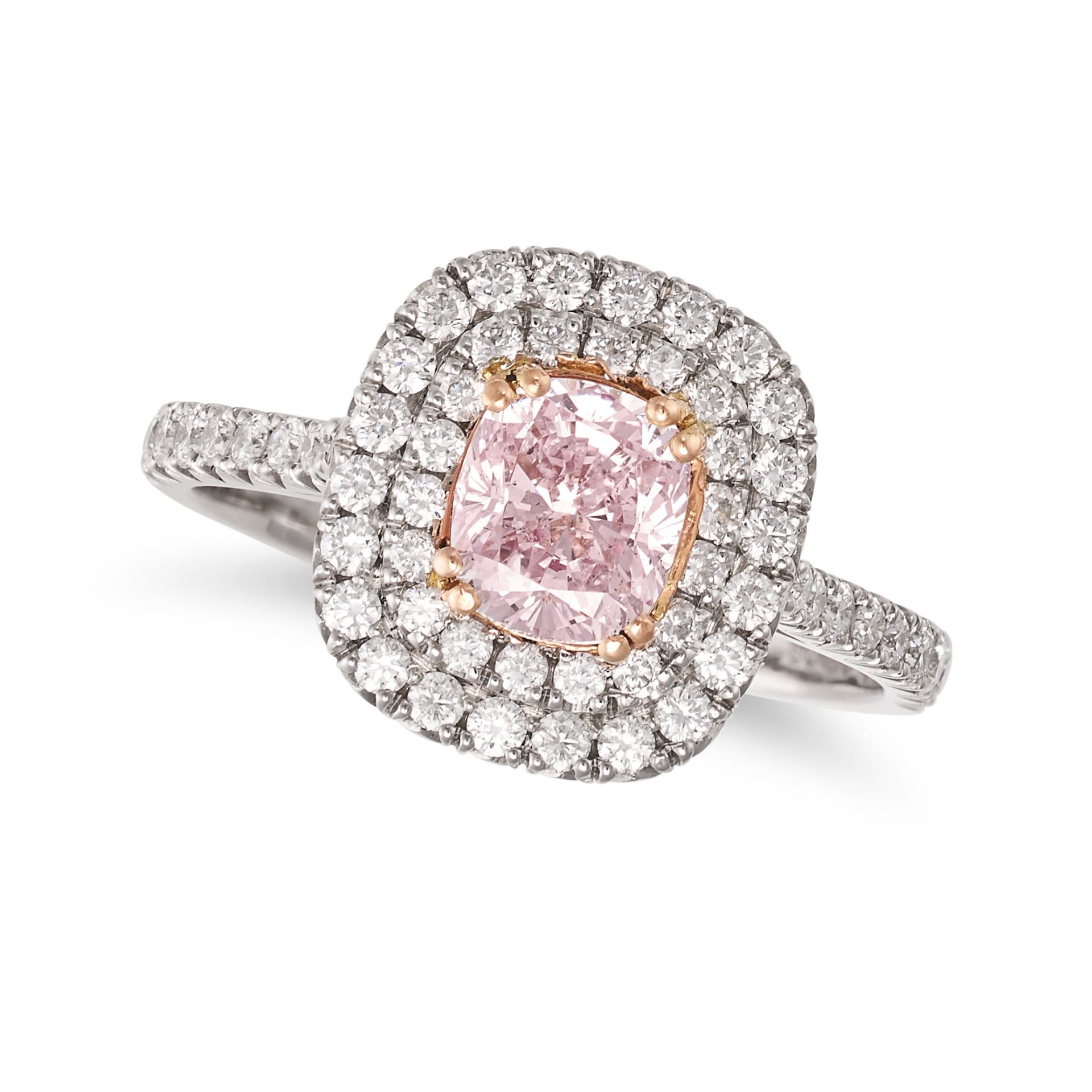 A PINK DIAMOND CLUSTER RING in platinum, set with a cushion cut pink diamond of 1.00 carat in a d...