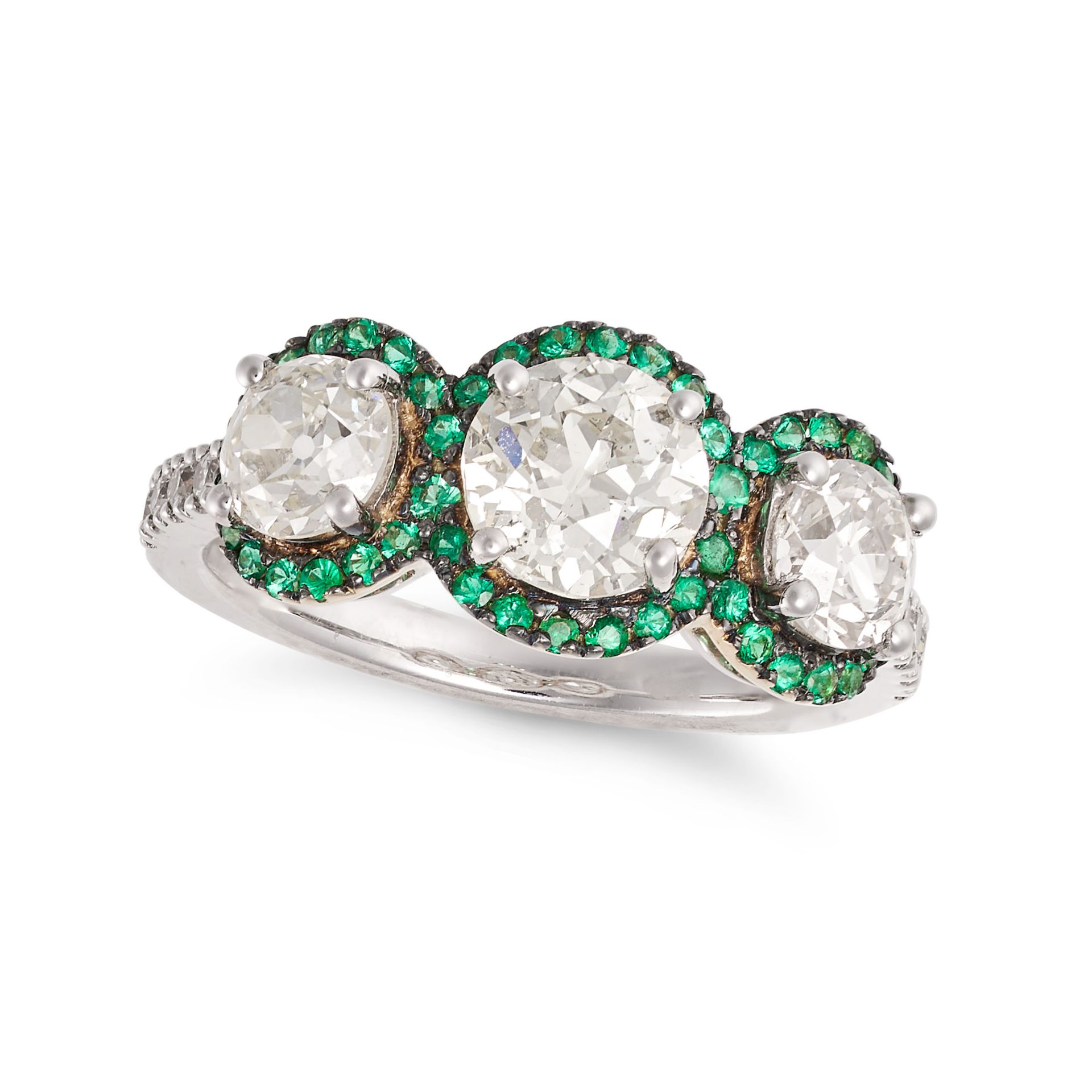 A DIAMOND AND EMERALD DRESS RING in 18ct white gold, set with three old European cut diamonds in ...