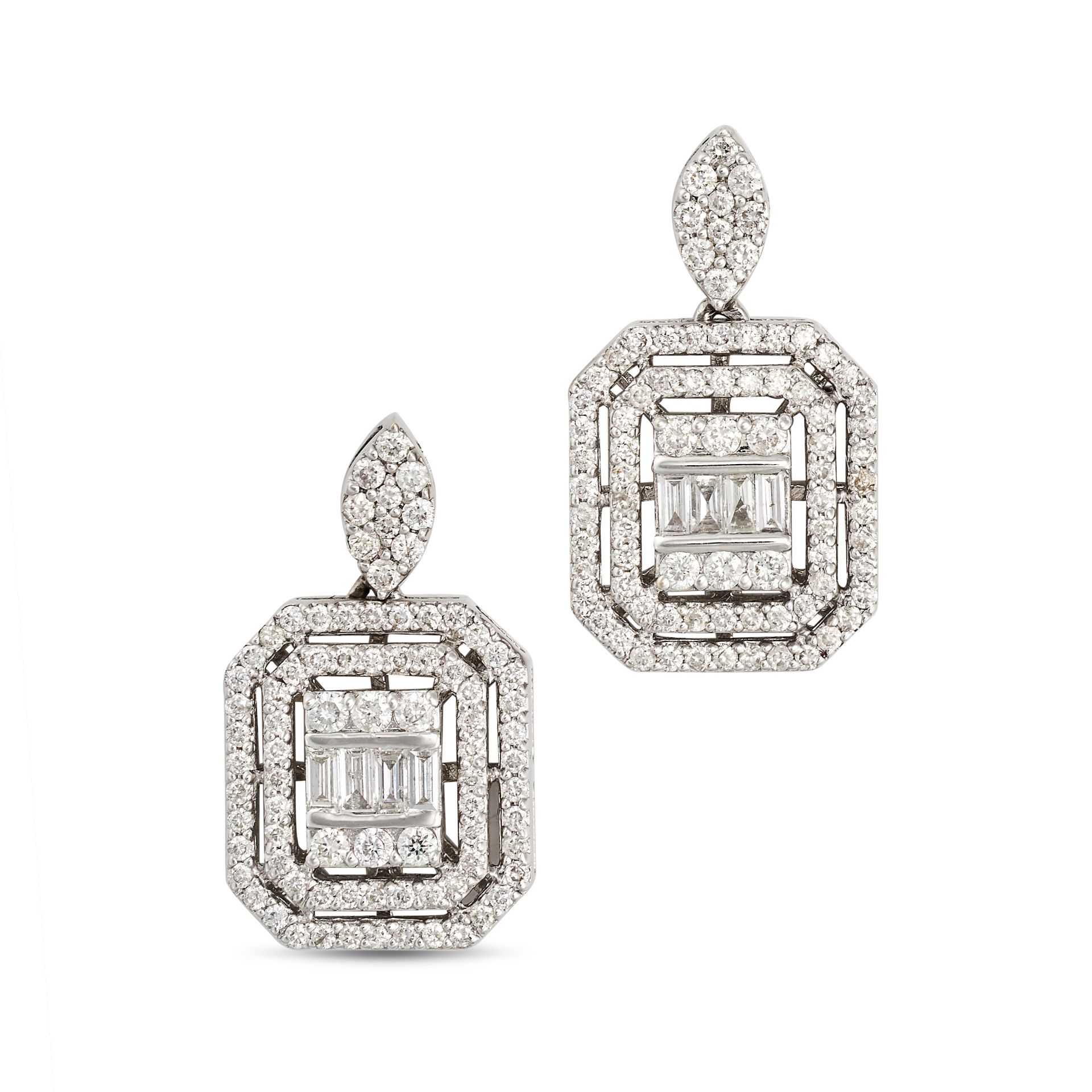 A PAIR OF DIAMOND DROP EARRINGS in 18ct white gold, each comprising an illusion set cluster of ro...