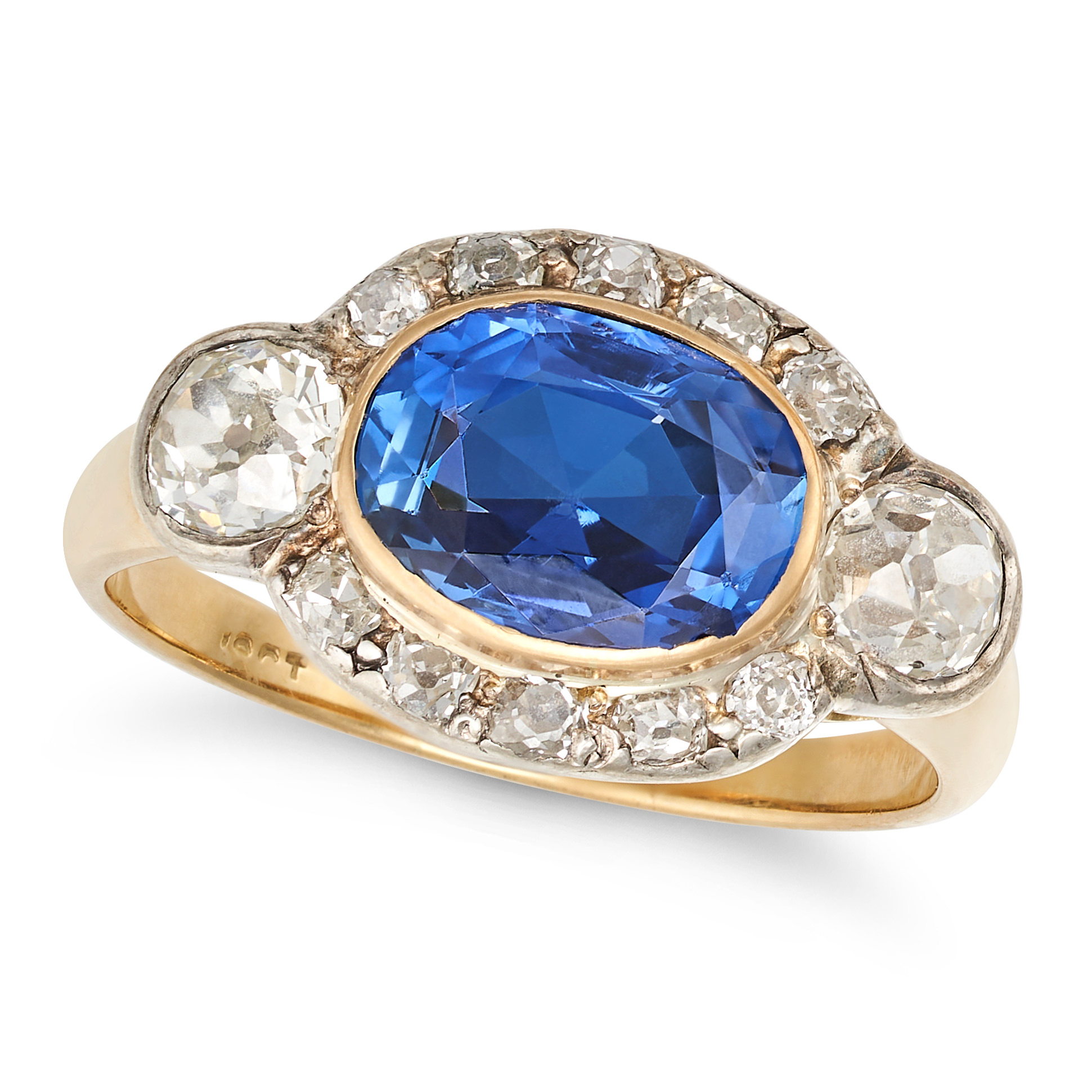 A BURMA NO HEAT SAPPHIRE AND DIAMOND RING in 18ct yellow and white gold, set with a cushion cut s...