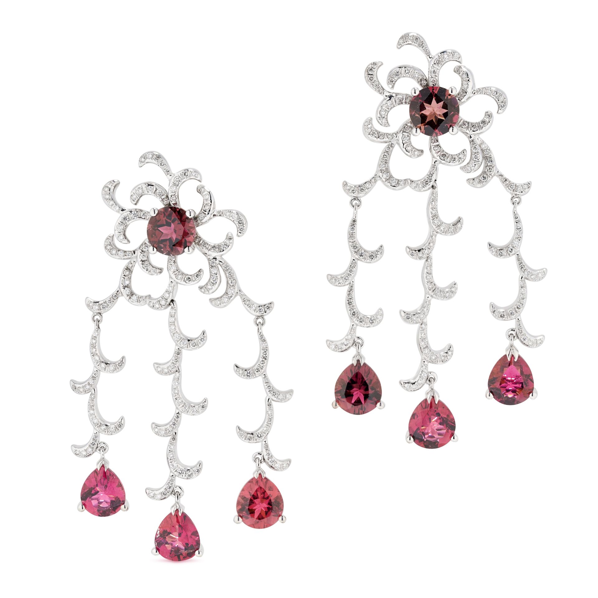 A PAIR OF PINK TOURMALINE AND DIAMOND CHANDELIER EARRINGS in 18ct white gold, each set with a rou...