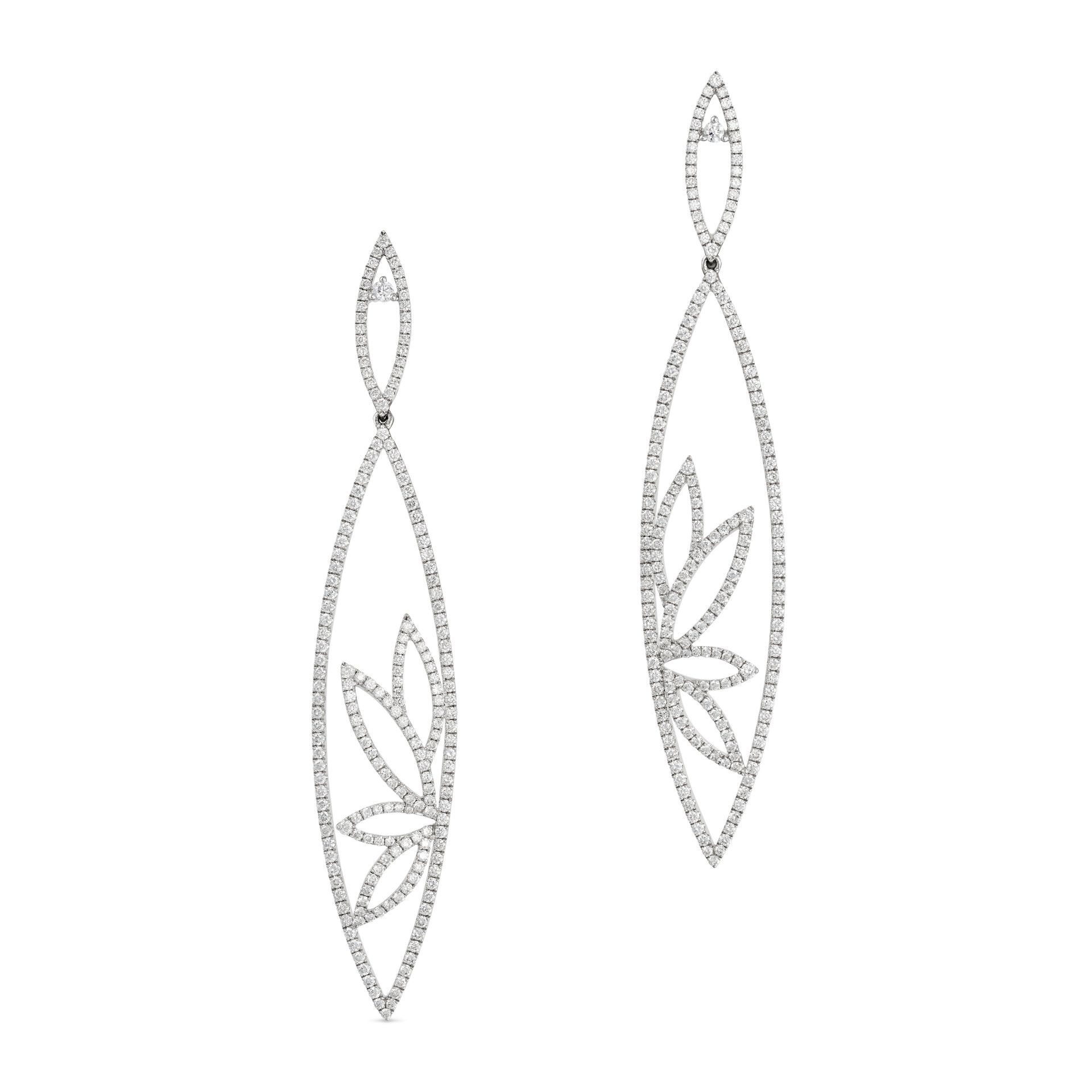 A PAIR OF DIAMOND DROP EARRINGS in 18ct white gold, each earring in an openwork floral design set...