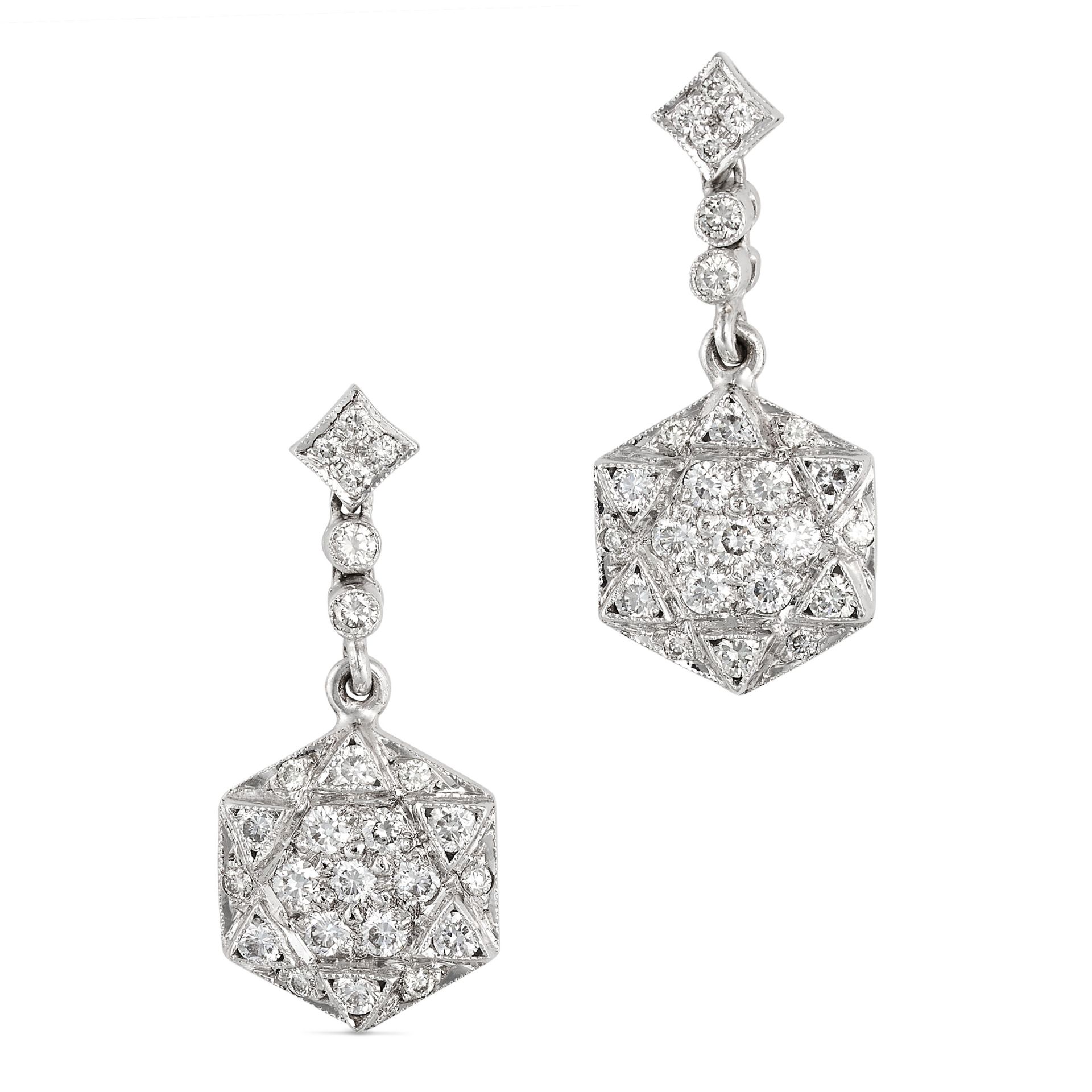 A PAIR OF DIAMOND DROP EARRINGS in 18ct white gold, each comprising a row of round brilliant cut ...