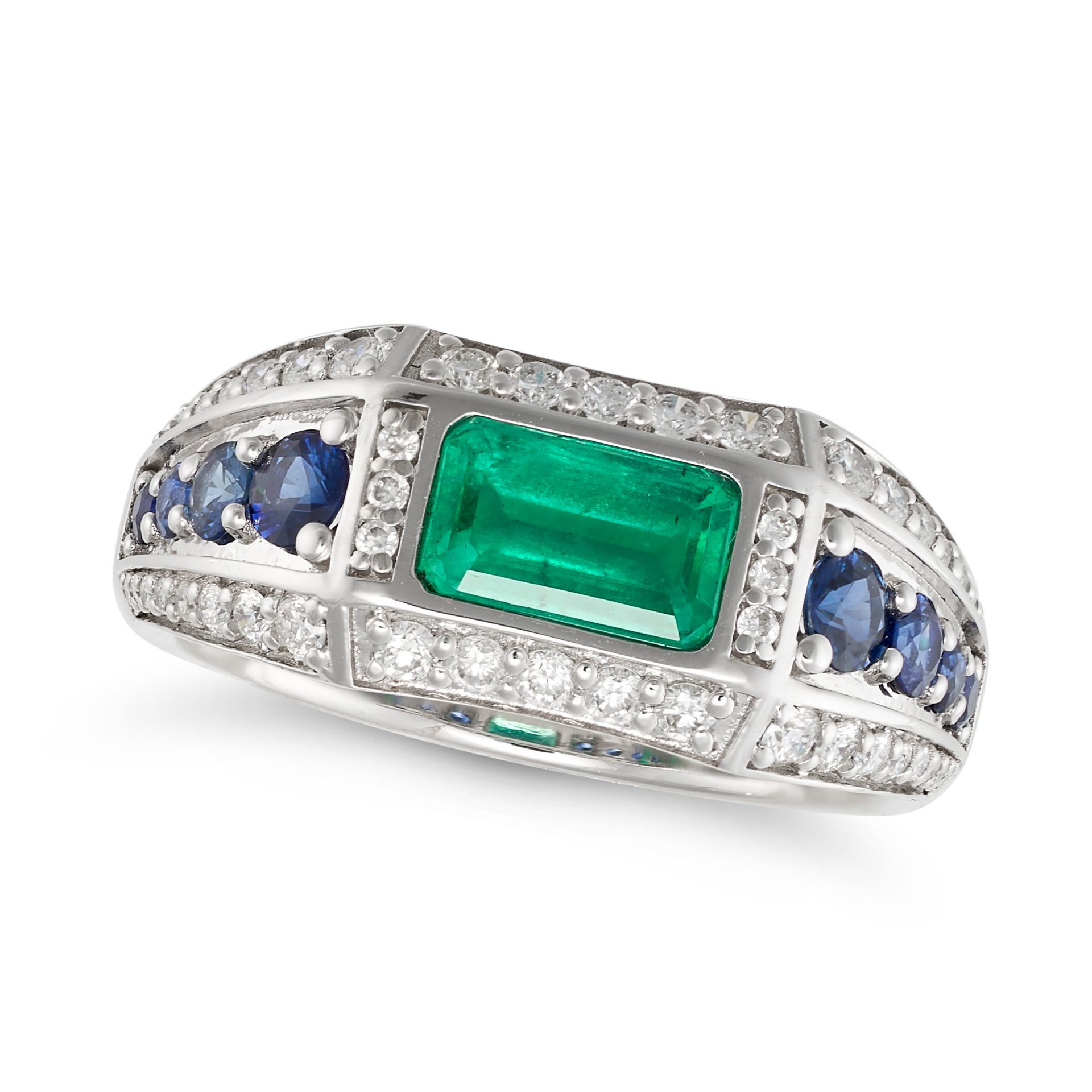 AN EMERALD, SAPPHIRE AND DIAMOND DRESS RING in 18ct white gold, set with an octagonal step cut em...