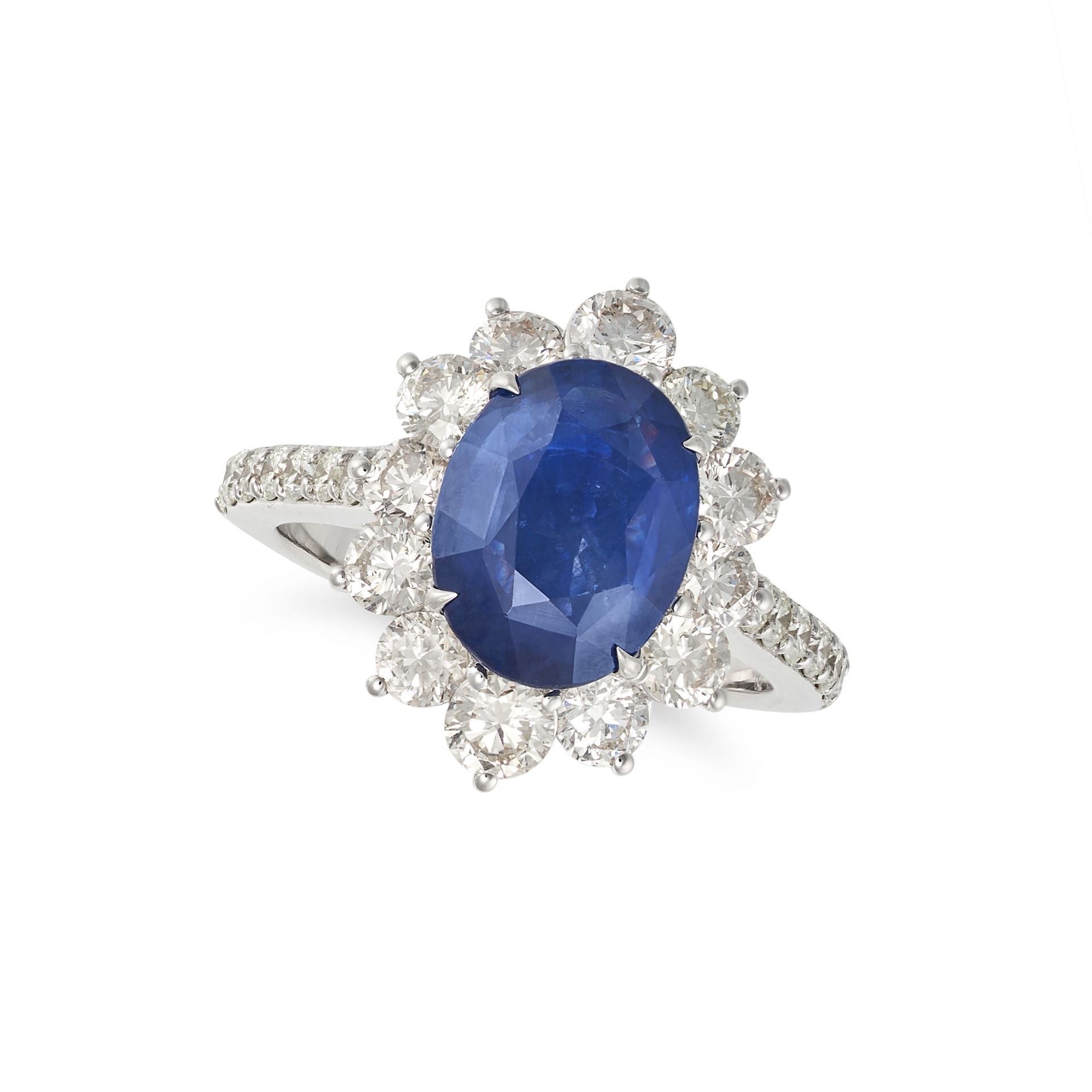 A SAPPHIRE AND DIAMOND CLUSTER RING in 18ct white gold, set with an oval cut sapphire of 4.19 car...