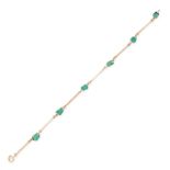 A VINTAGE TURQUOISE BRACELET in yellow gold, comprising a row of rectangular links accented by tu...
