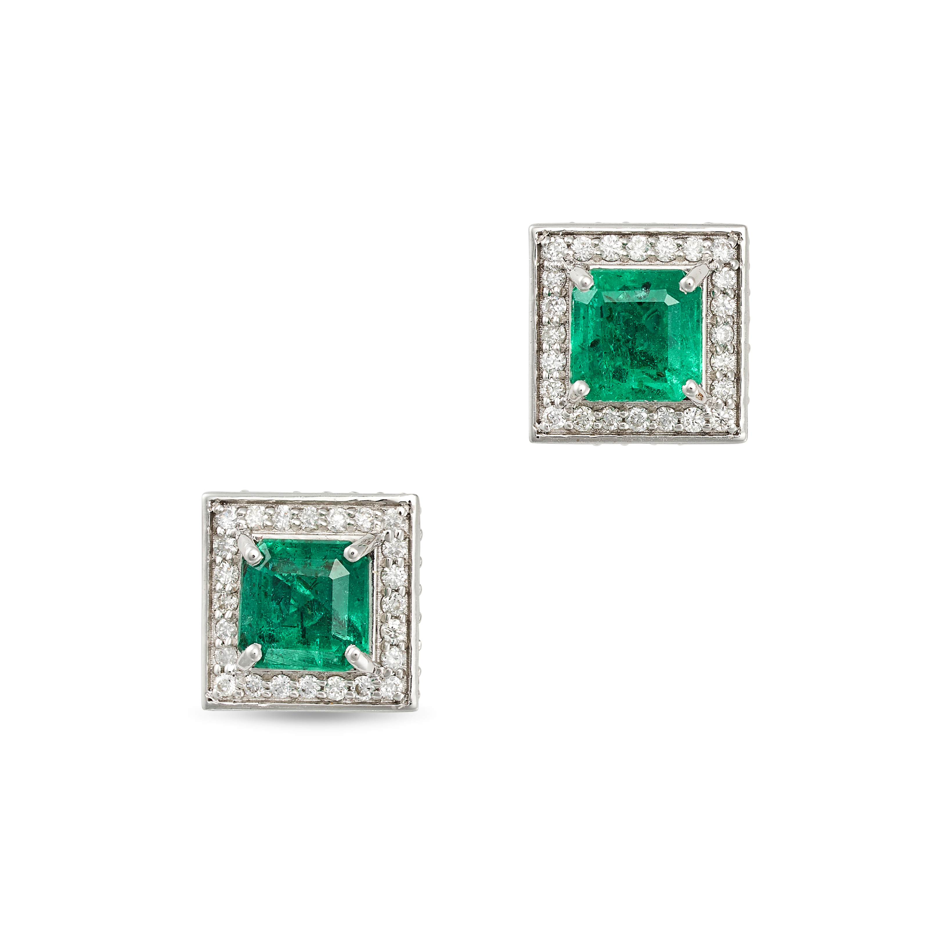 A PAIR OF EMERALD AND DIAMOND EARRINGS in 18ct white gold, each set with a square step cut emeral...