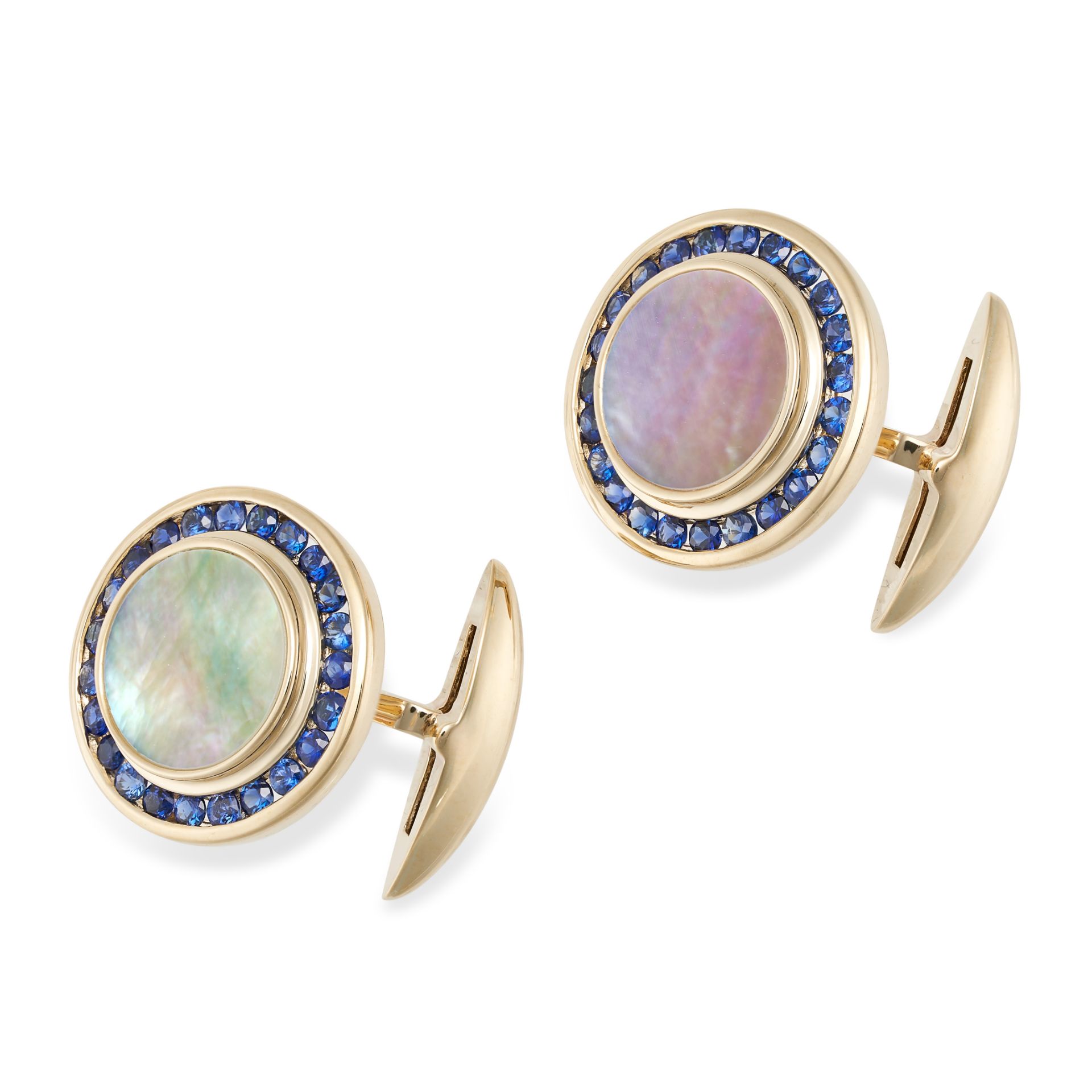 A PAIR OF MOTHER OF PEARL AND SAPPHIRE CUFFLINKS in 9ct yellow gold, the circular faces set with ...