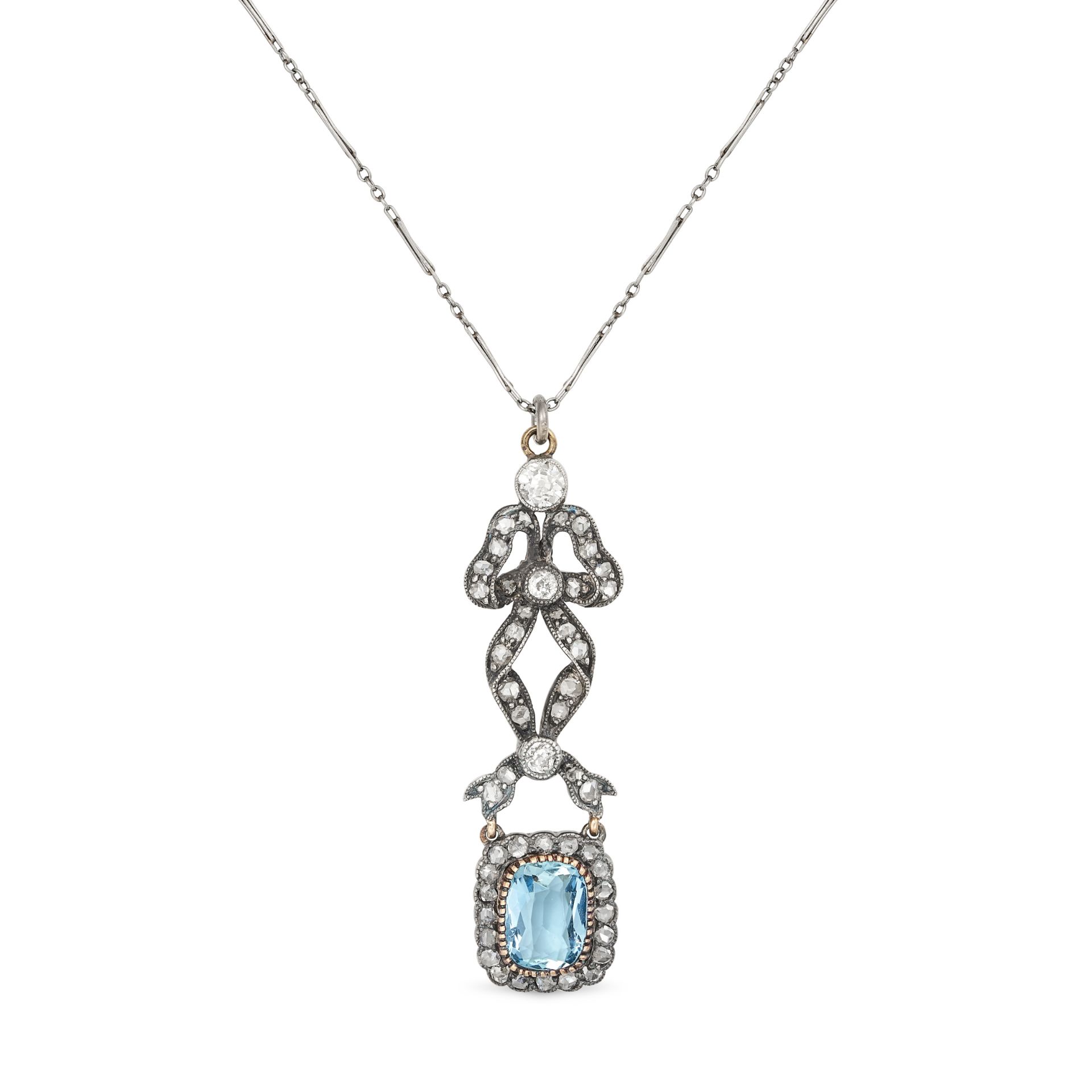 AN ANTIQUE AQUAMARINE AND DIAMOND PENDANT NECKLACE in yellow gold and silver, the pendant designe...