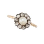 NO RESERVE - A VINTAGE PEARL AND DIAMOND CLUSTER RING in yellow gold, set with a pearl in a clust...