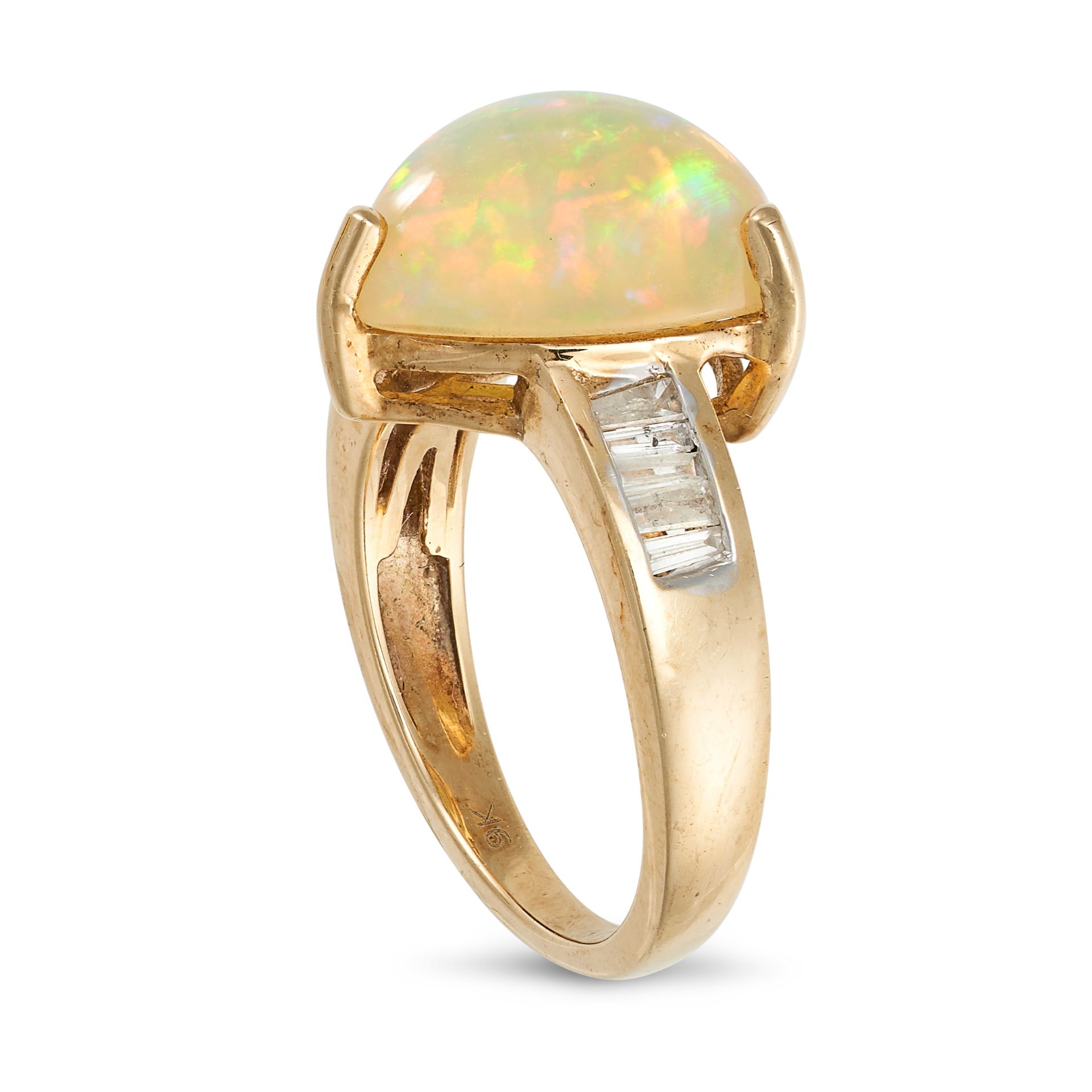 AN OPAL AND DIAMOND RING in 9ct yellow gold, set with a triangular cabochon opal, the band set wi... - Bild 2 aus 2