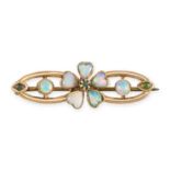 AN ANTIQUE OPAL AND GREEN GARNET BROOCH in 15ct yellow gold, set with a round cut green garnet in...