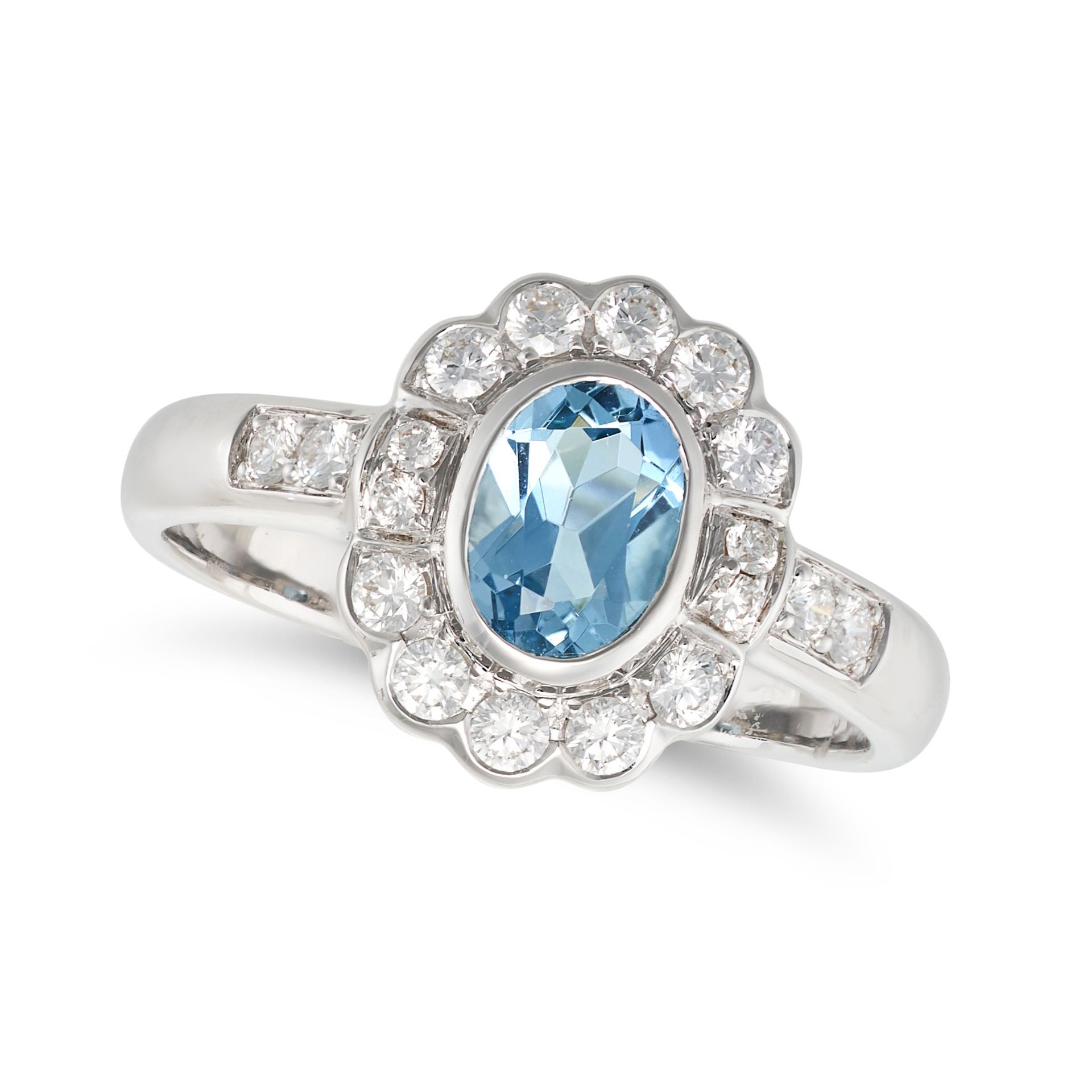 AN AQUAMARINE AND DIAMOND CLUSTER RING in 18ct white gold, set with an oval cut aquamarine of 0.9...