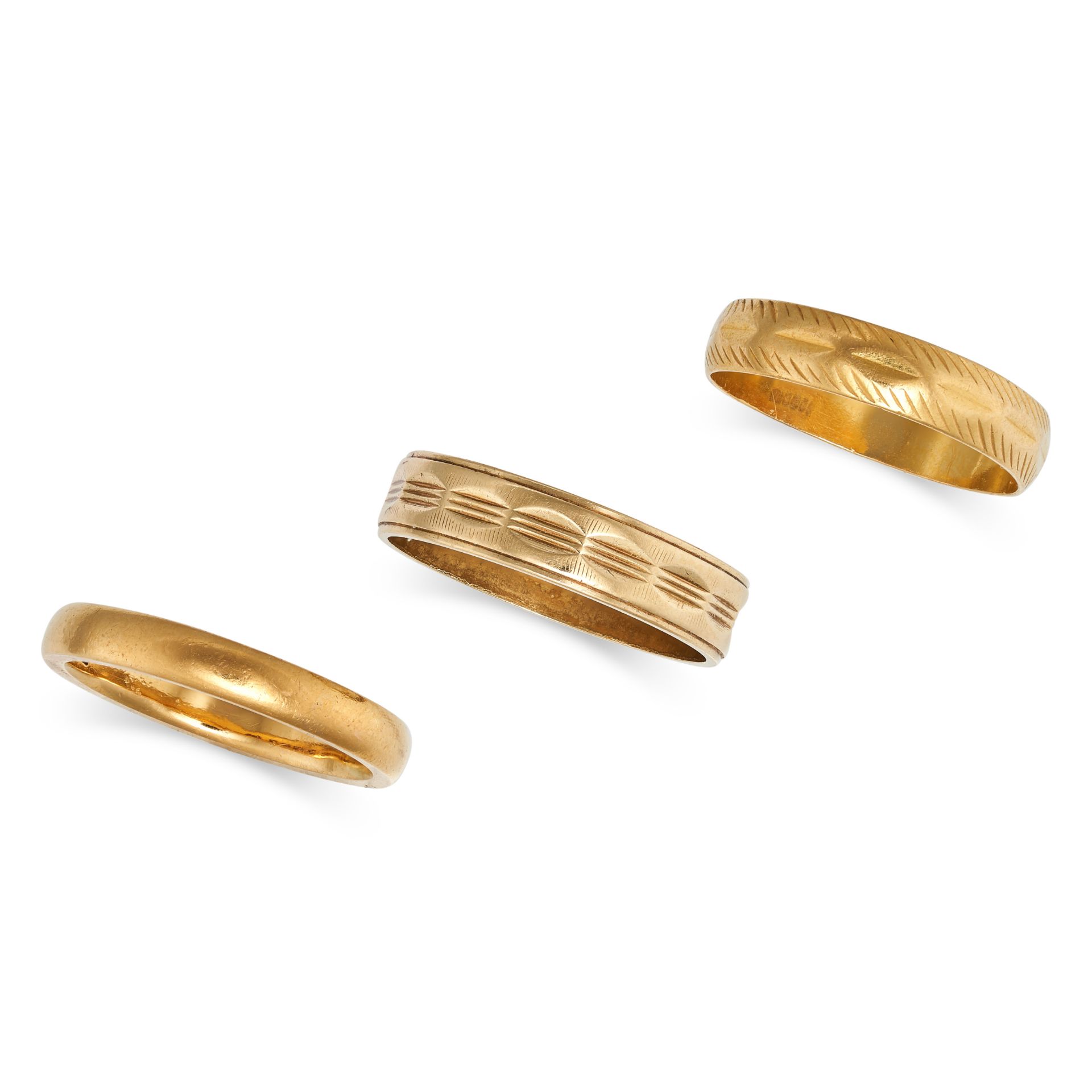 THREE GOLD RINGS in 18ct and 22ct yellow gold, one with full British hallmarks for London 1852, s...