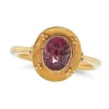 AN ANTIQUE GARNET CAMEO in yellow gold, set with a garnet cameo depicting an ancient warrior in a...