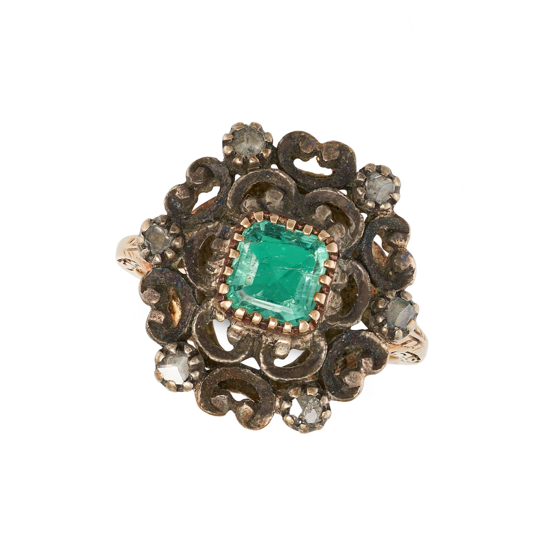 AN EMERALD AND DIAMOND RING in 18ct yellow gold and silver, set with an octagonal step cut emeral...