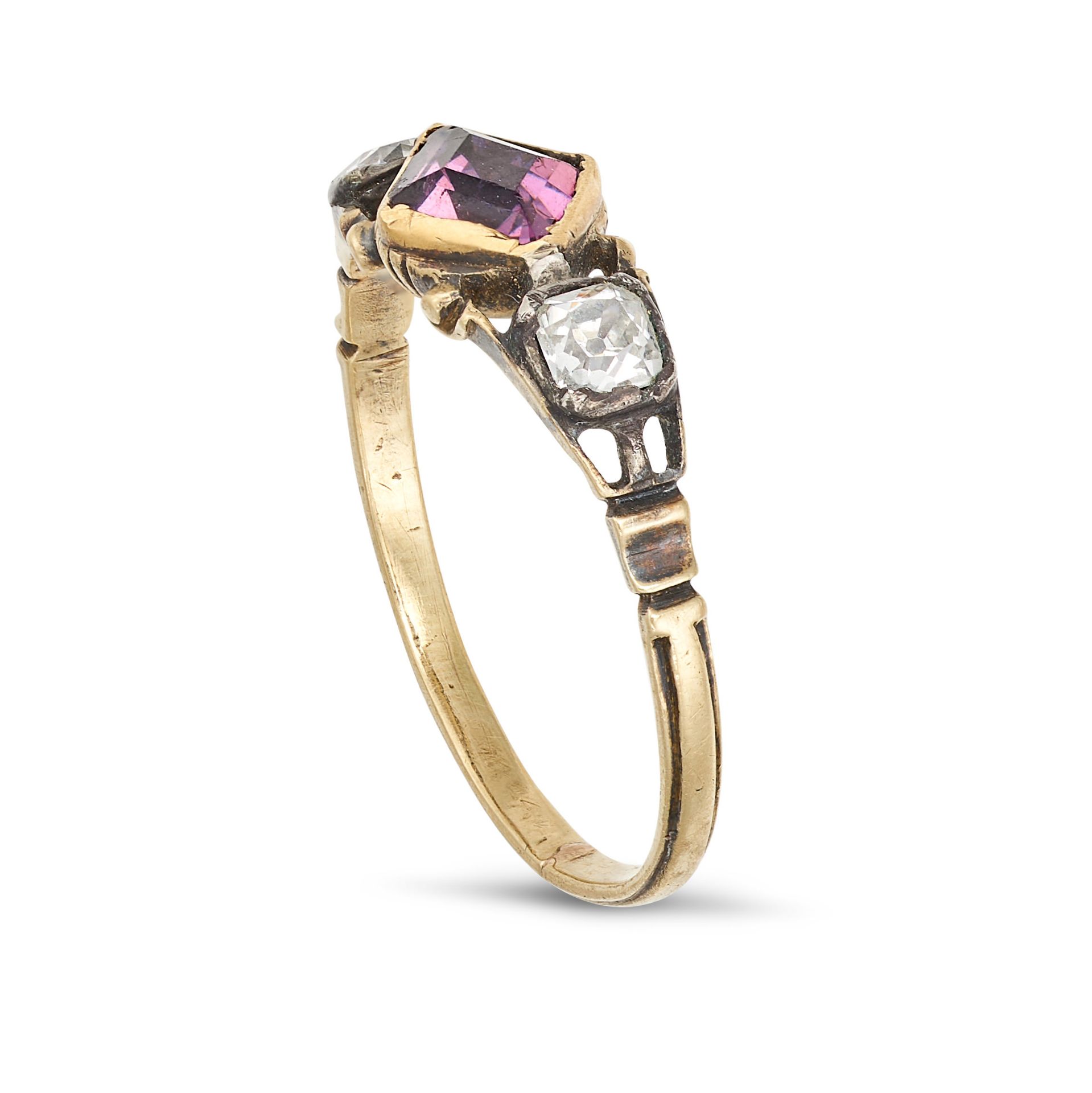 AN ANTIQUE AMETHYST AND DIAMOND THREE STONE RING in yellow gold and silver, set with a step cut a... - Image 2 of 2