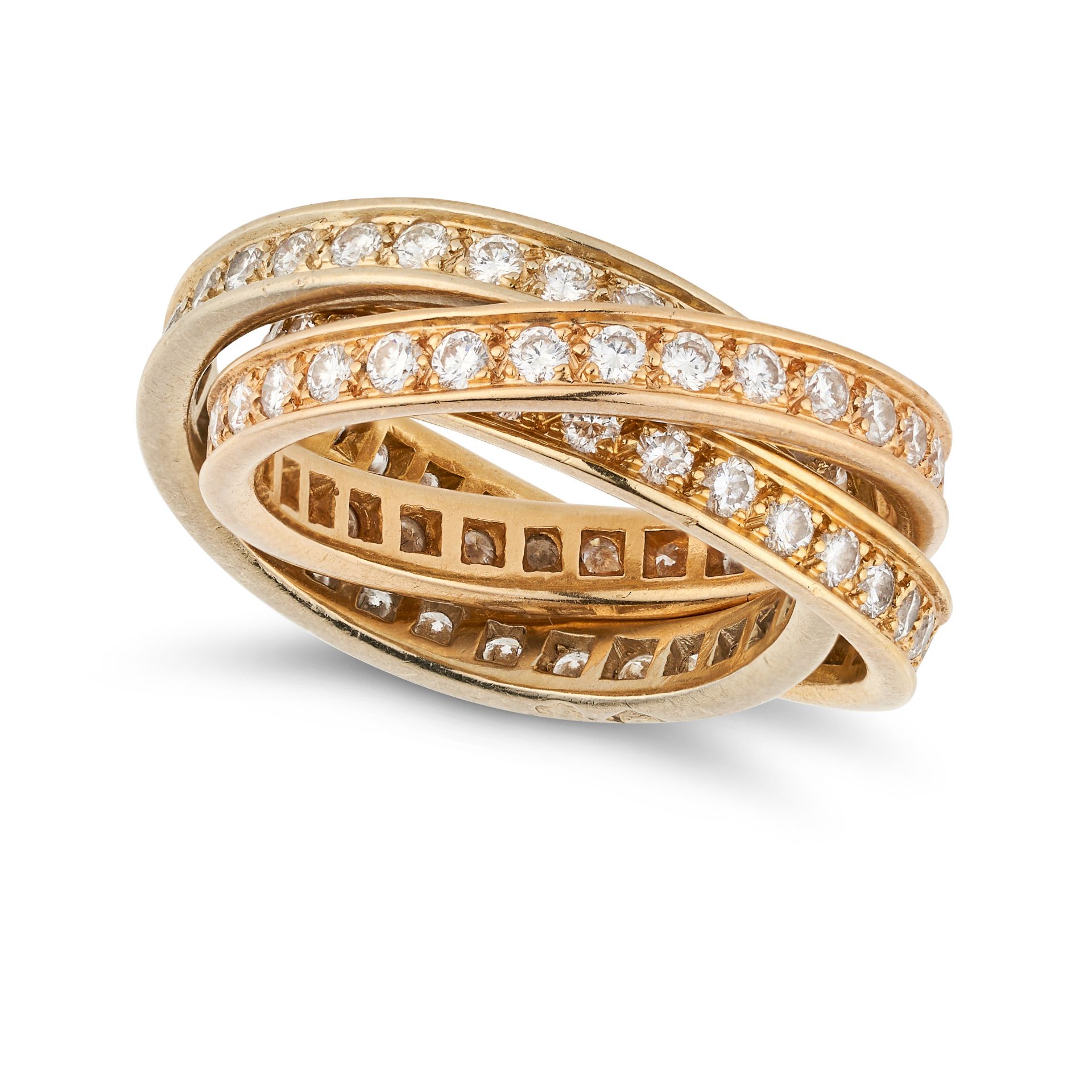 CARTIER, A DIAMOND TRINITY RING in 18ct yellow, white and rose gold, comprising three interlockin...