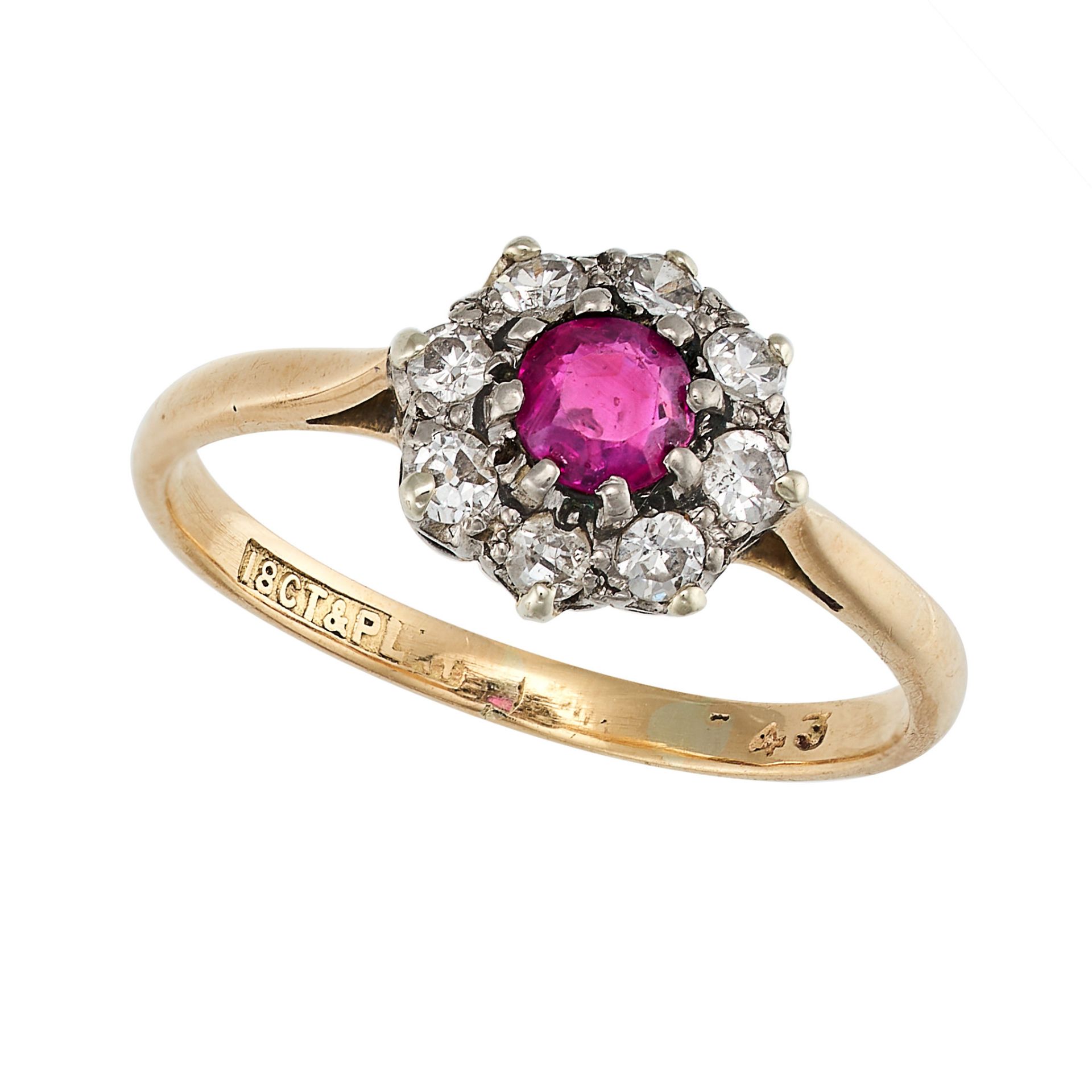 NO RESERVE - A VINTAGE RUBY AND DIAMOND RING in 18ct yellow gold and platinum, set with a round c...