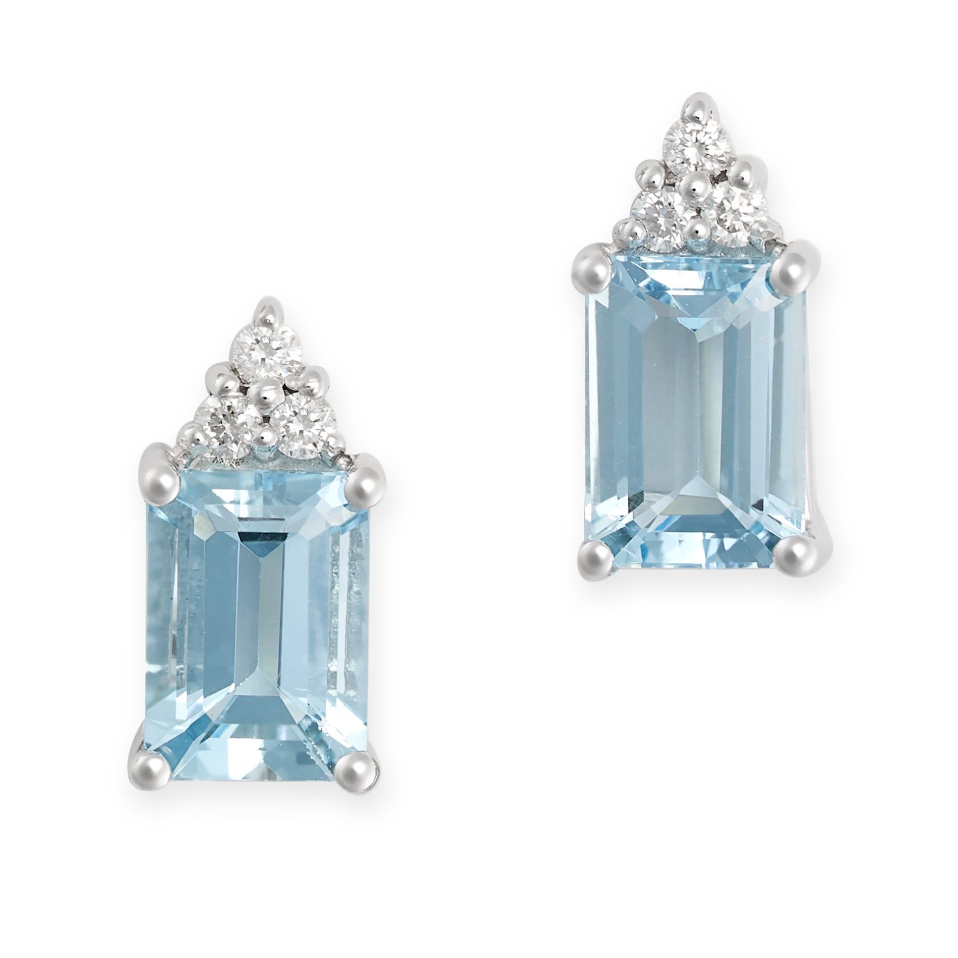 A PAIR OF AQUAMARINE AND DIAMOND EARRINGS in 18ct white gold, each set with a trio of round brill...
