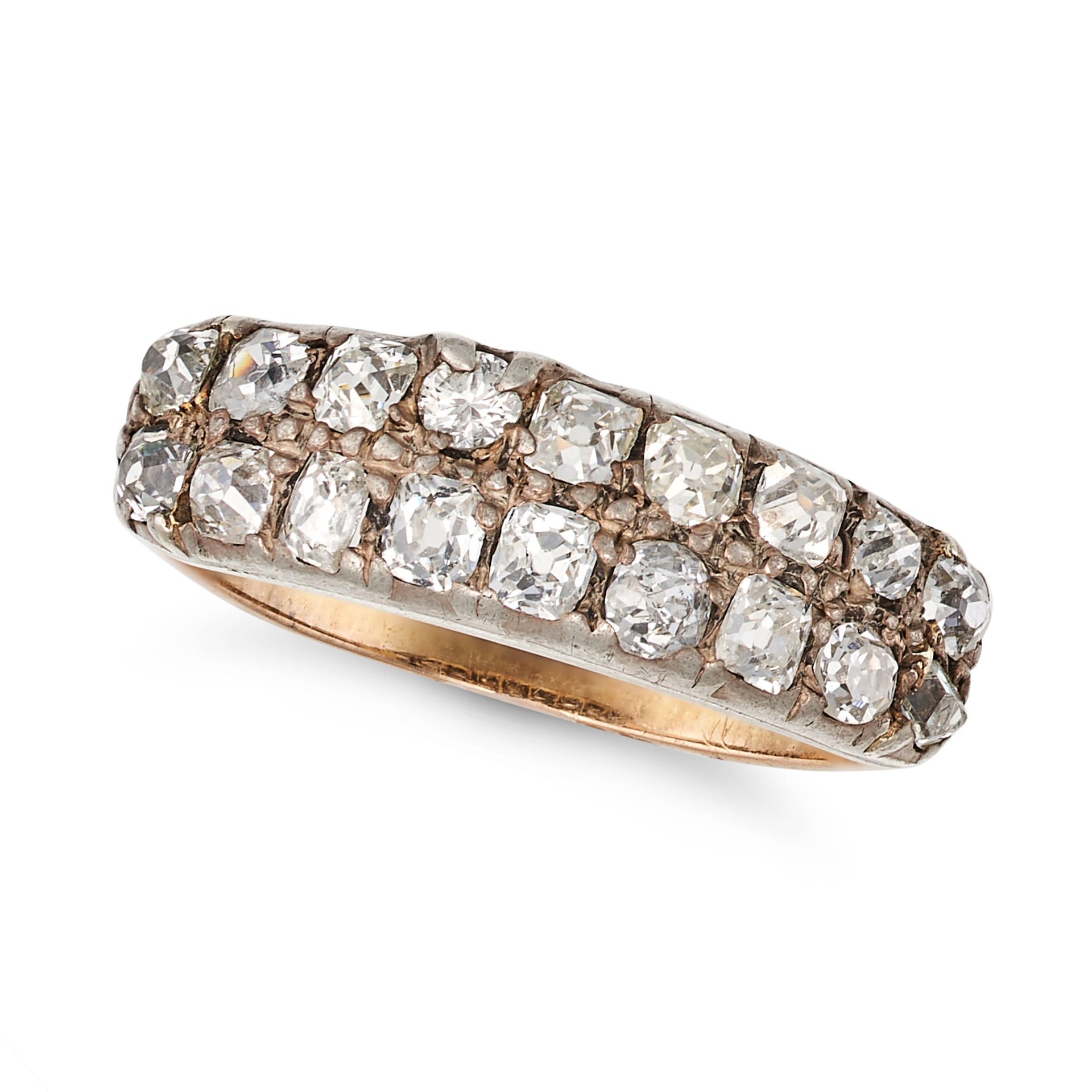 AN ANTIQUE DIAMOND RING in yellow gold and silver, set with two rows of old mine cut diamonds, on...