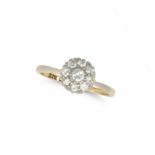 A DIAMOND CLUSTER RING in platinum and 18ct yellow gold, set with a cluster of round brilliant cu...