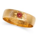 AN ANTIQUE VICTORIAN RED GLASS BAND RING in 22ct yellow gold, set with a cabochon red glass in a ...