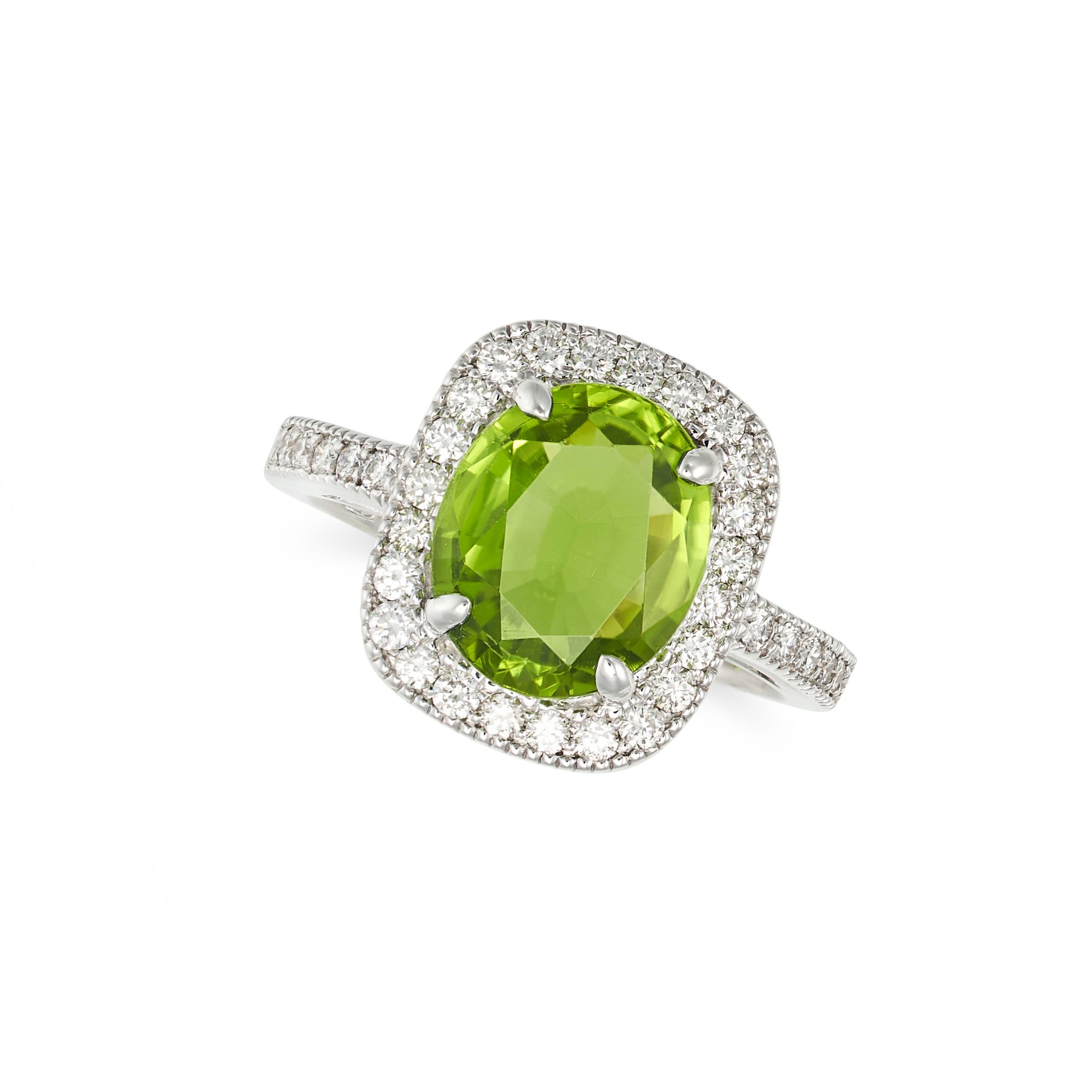 A PERIDOT AND DIAMOND RING in 18ct white gold, set with an oval cut peridot of approximately 2.50...