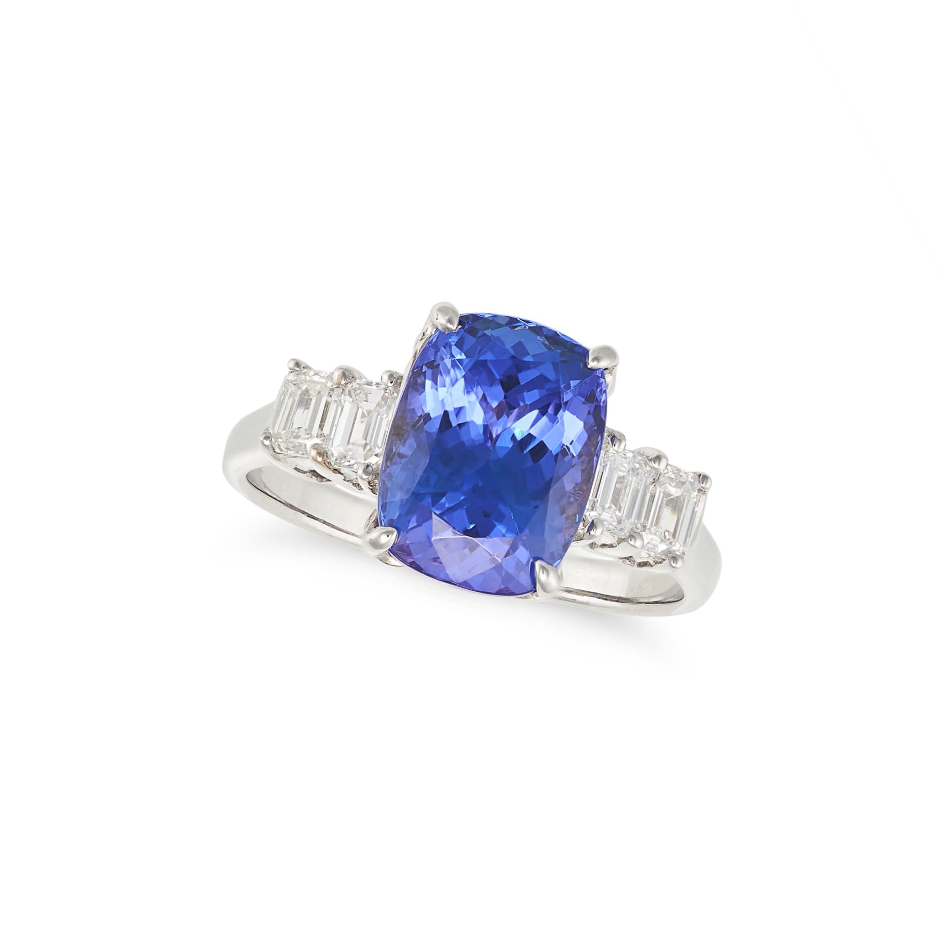 A TANZANITE AND DIAMOND RING in 18ct white gold, set with a cushion cut tanzanite of 3.89 carats,...