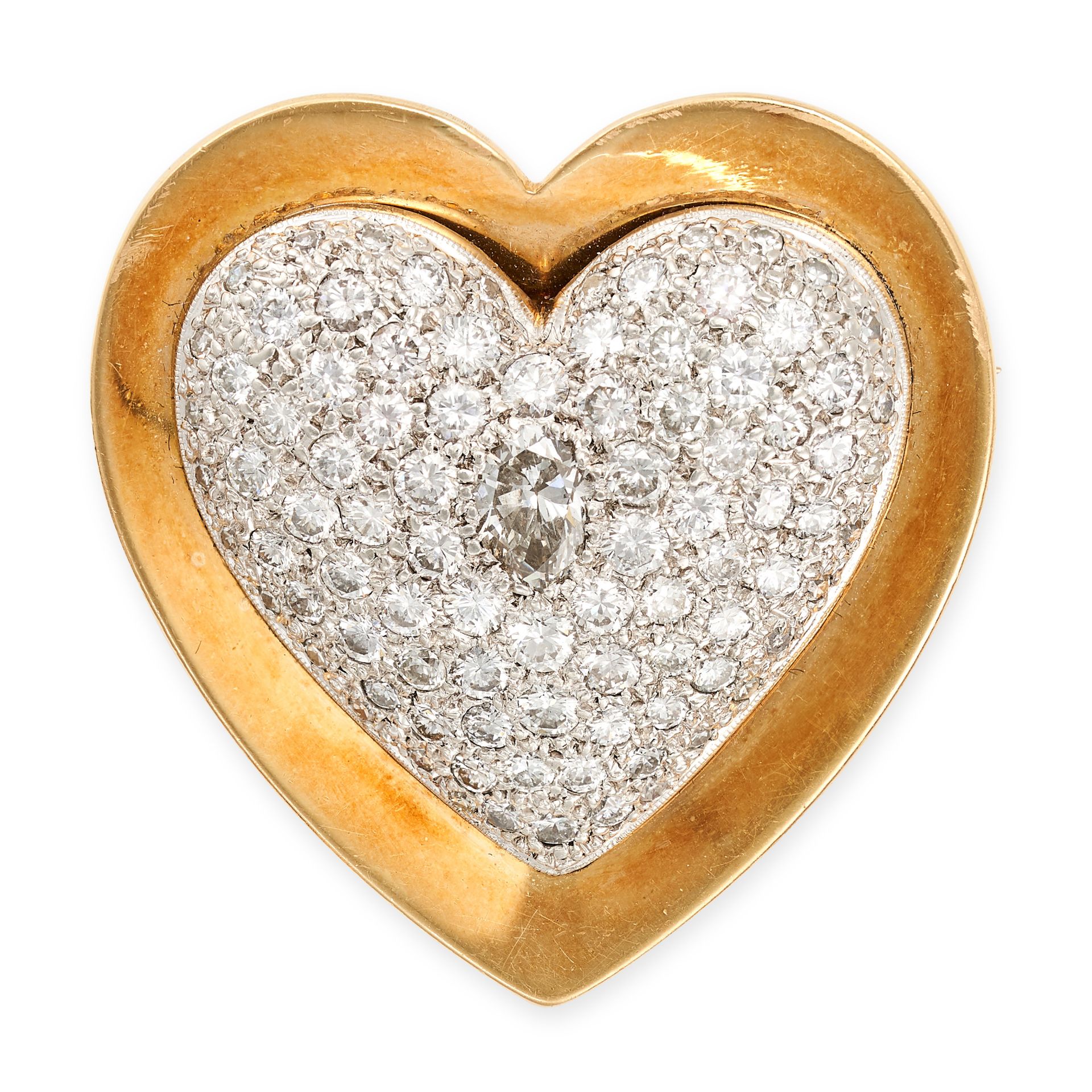 A VINTAGE DIAMOND HEART BROOCH, CIRCA 1952 in 18ct yellow and white gold, the domed heart shaped ...