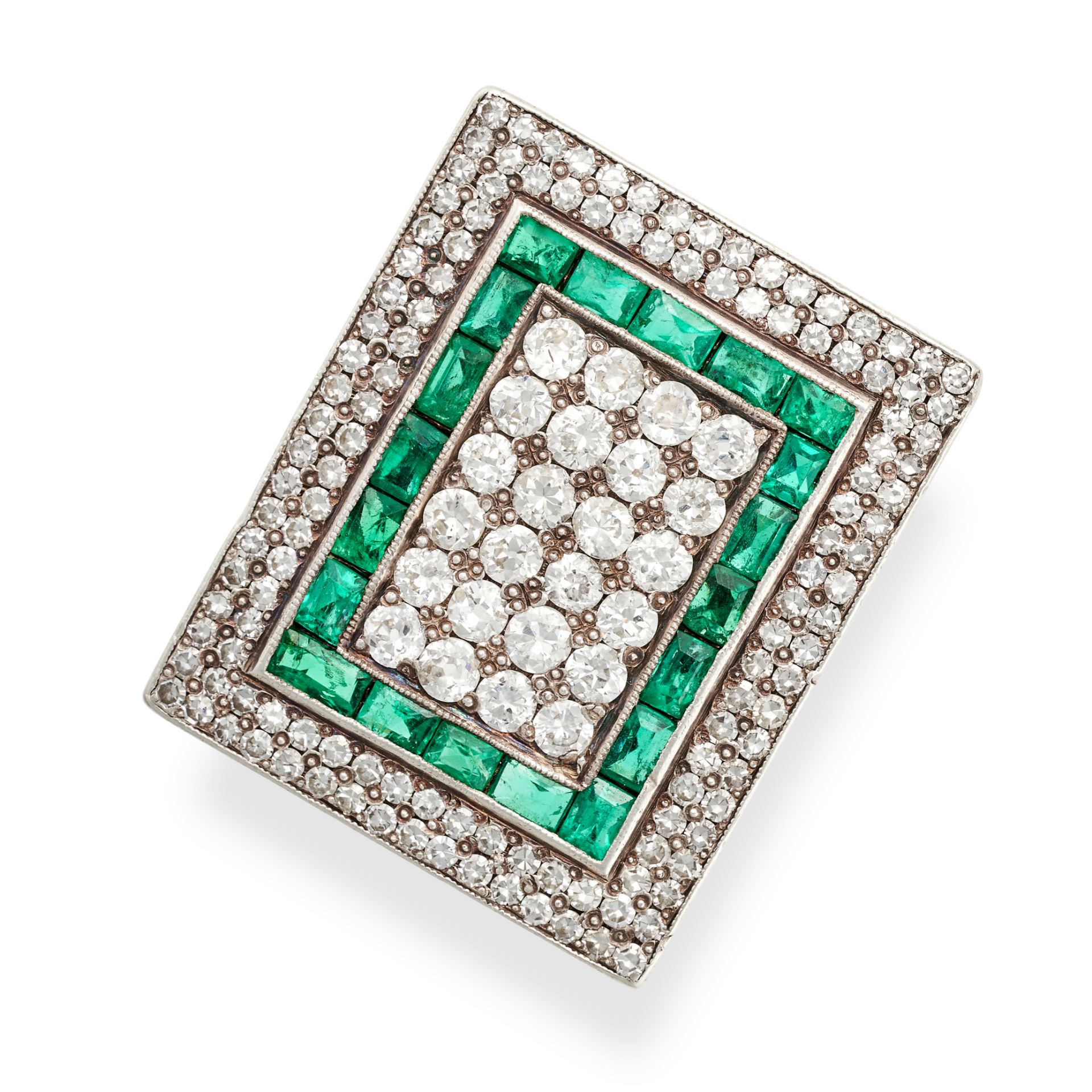 TIFFANY & CO., AN ART DECO EMERALD AND DIAMOND DRESS RING in 18ct yellow gold, the rectangular fa...