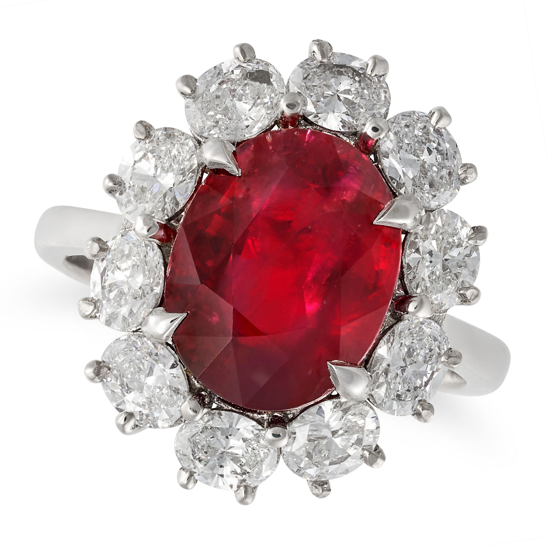 AN IMPORTANT PIGEON'S BLOOD BURMA NO HEAT RUBY AND DIAMOND CLUSTER RING in 18ct white gold, set w...