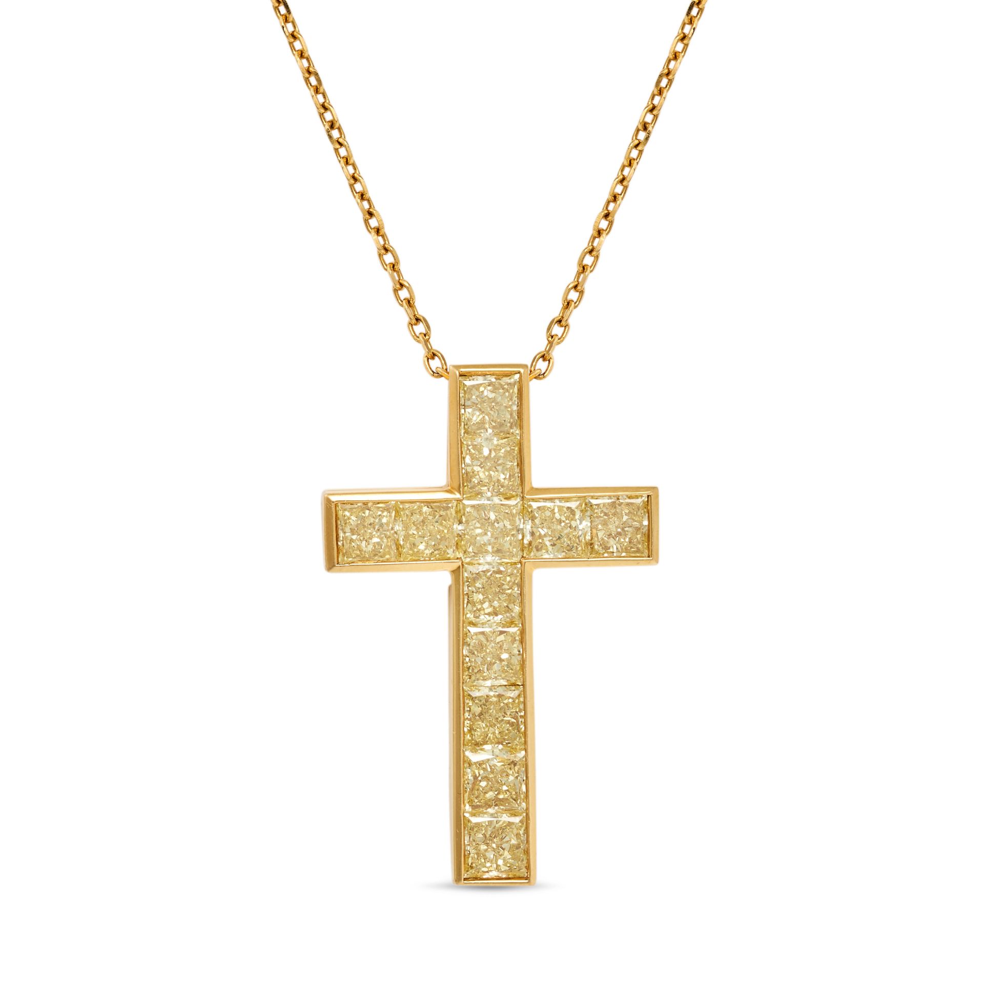 A YELLOW DIAMOND CROSS PENDANT NECKLACE in 18ct yellow gold, the pendant designed as a cross set ...